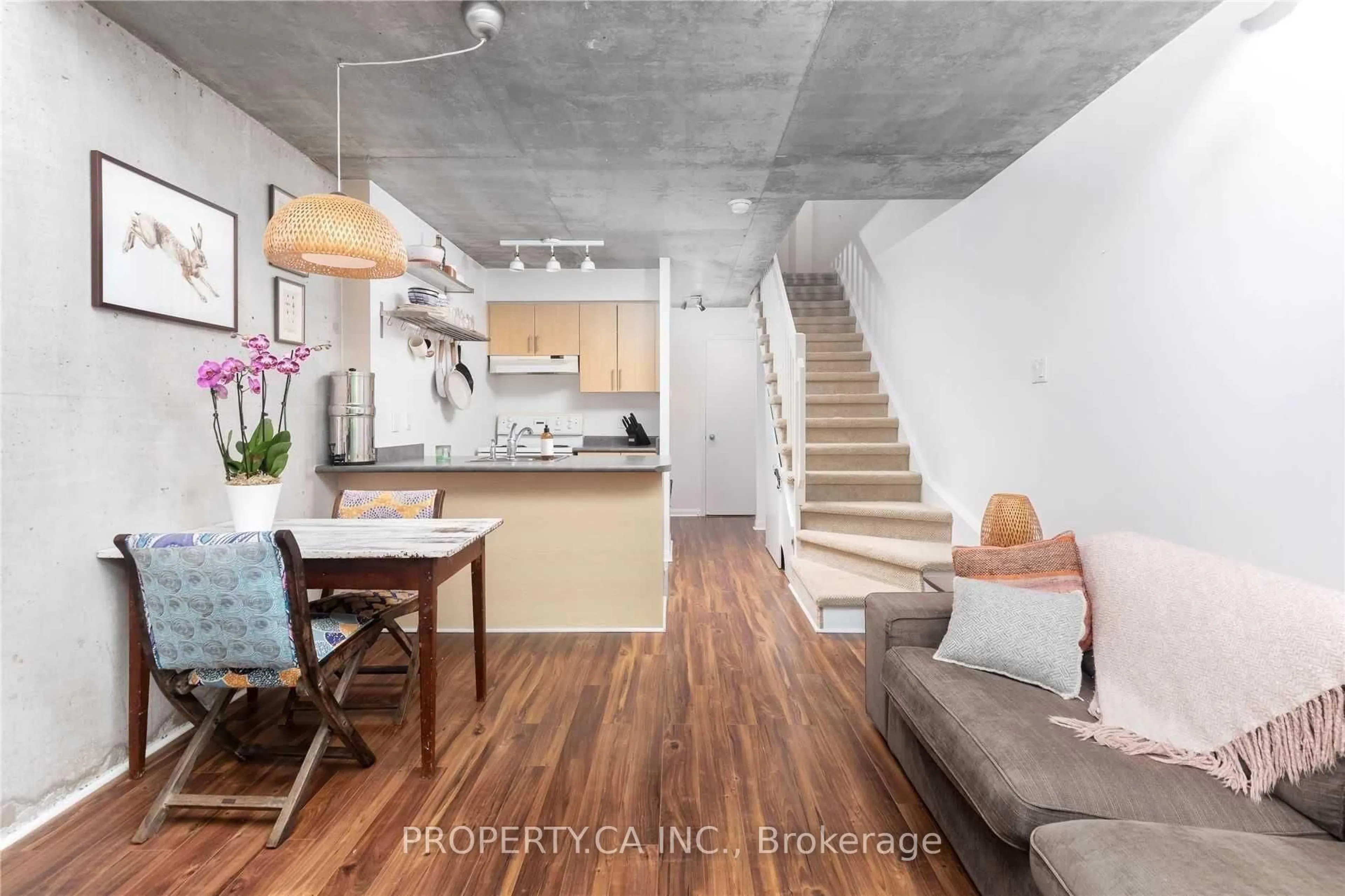 Open concept kitchen, cement floor for 954 King St #302, Toronto Ontario M6K 3L9