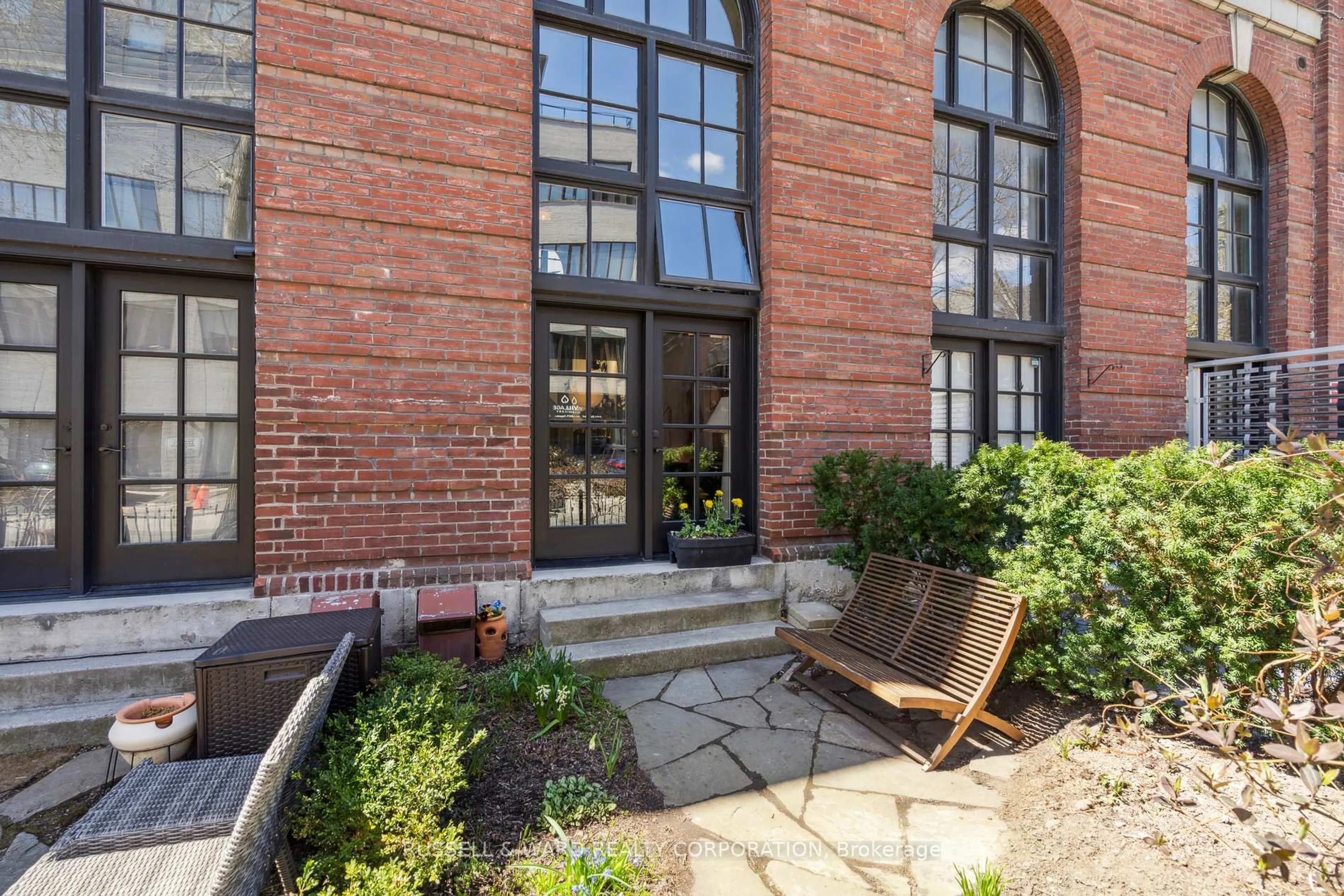 Home with brick exterior material, street for 394 Euclid Ave #103, Toronto Ontario M6G 2S9