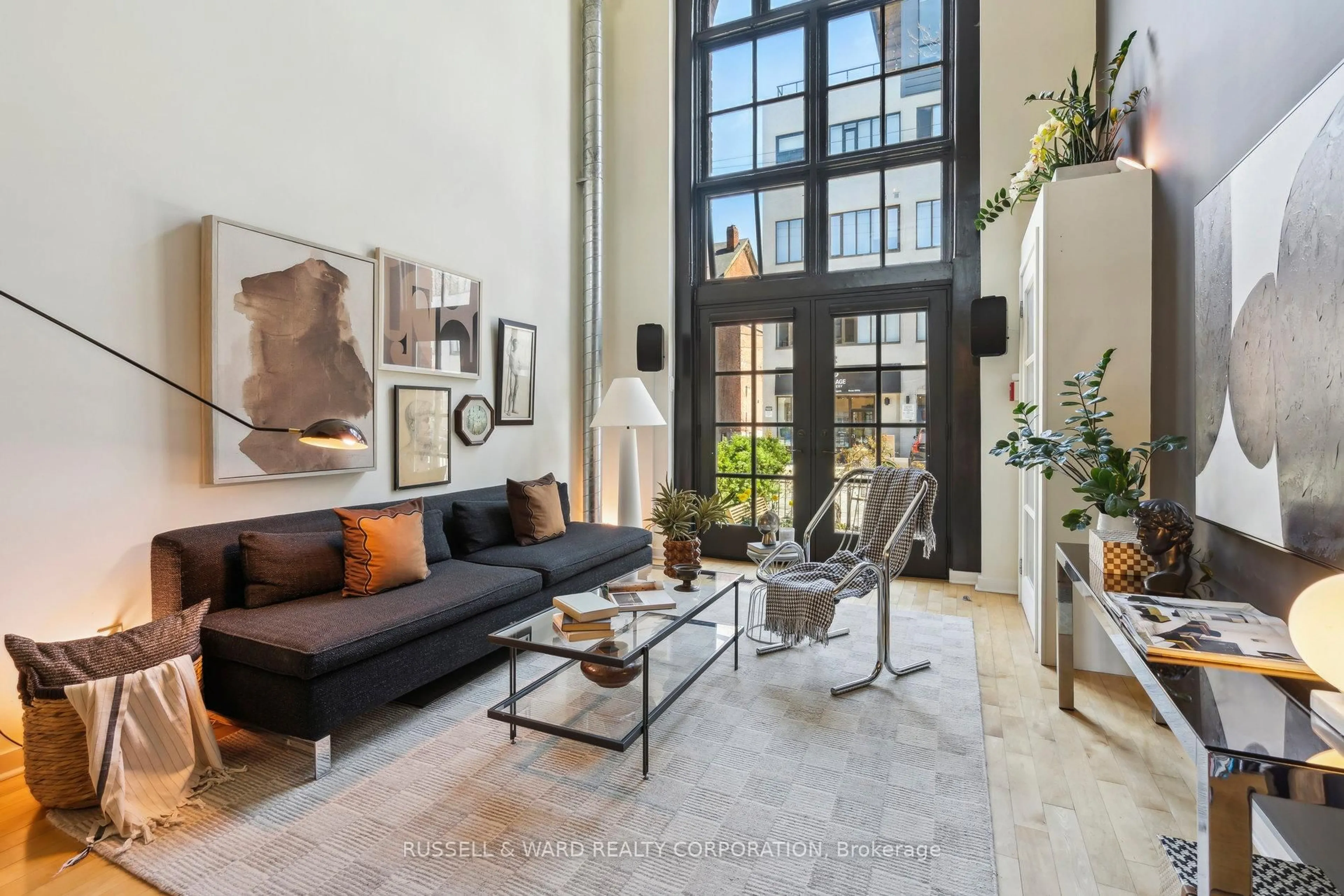 Living room with furniture, cement floor for 394 Euclid Ave #103, Toronto Ontario M6G 2S9