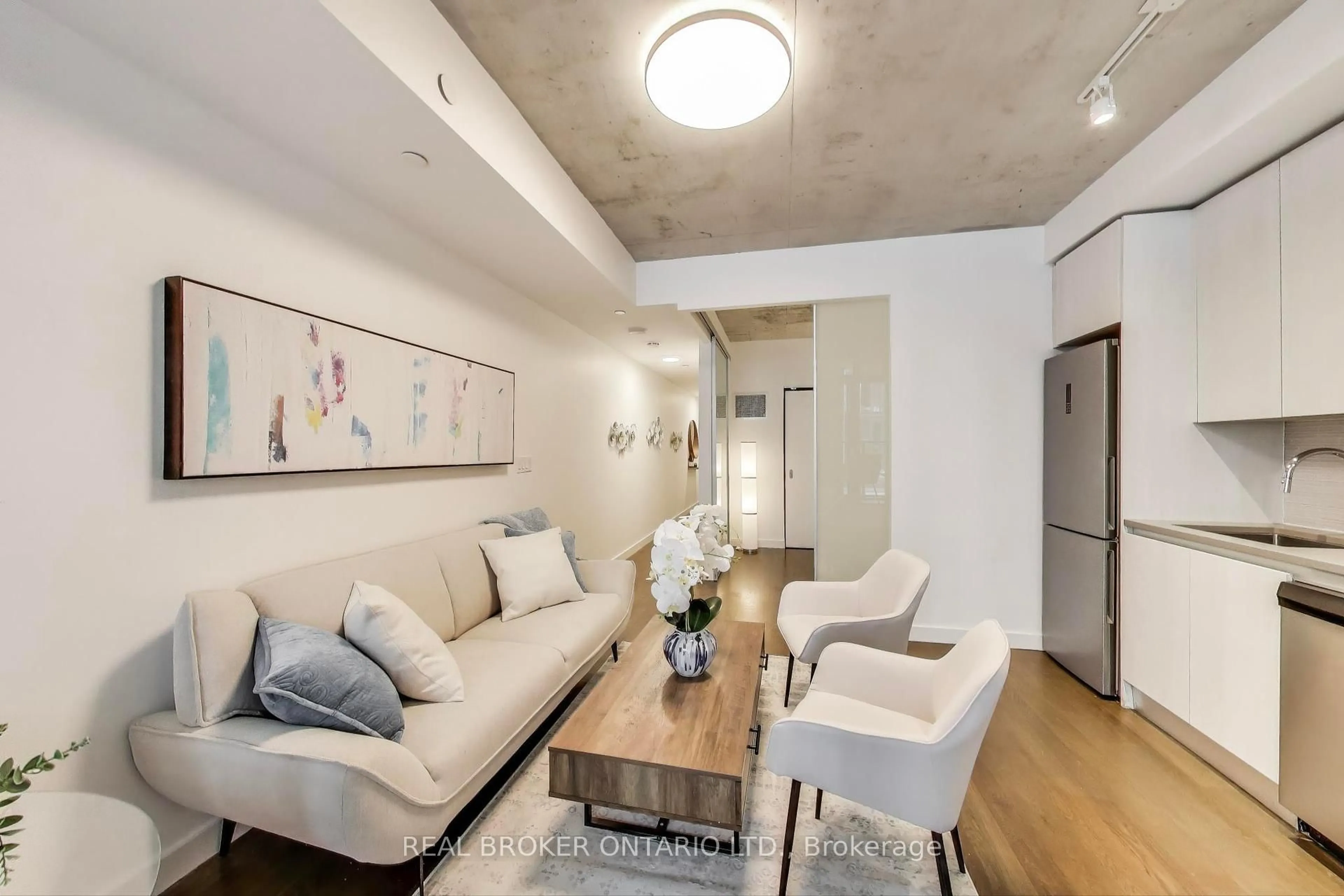 Living room with furniture, unknown for 111 Bathurst St #320, Toronto Ontario M5V 2P9