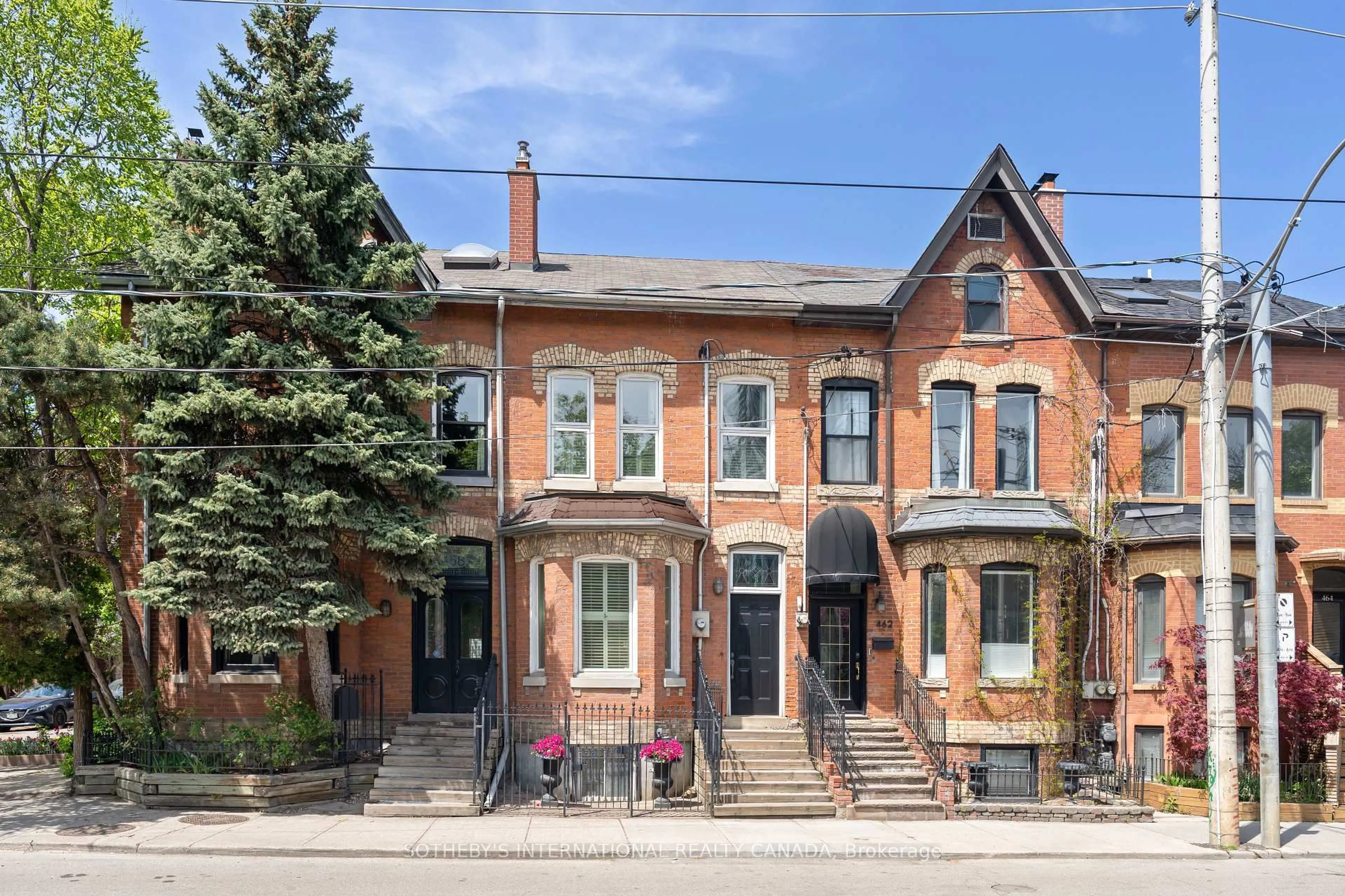 Home with brick exterior material, street for 458-460 Gerrard St, Toronto Ontario M5A 2H3