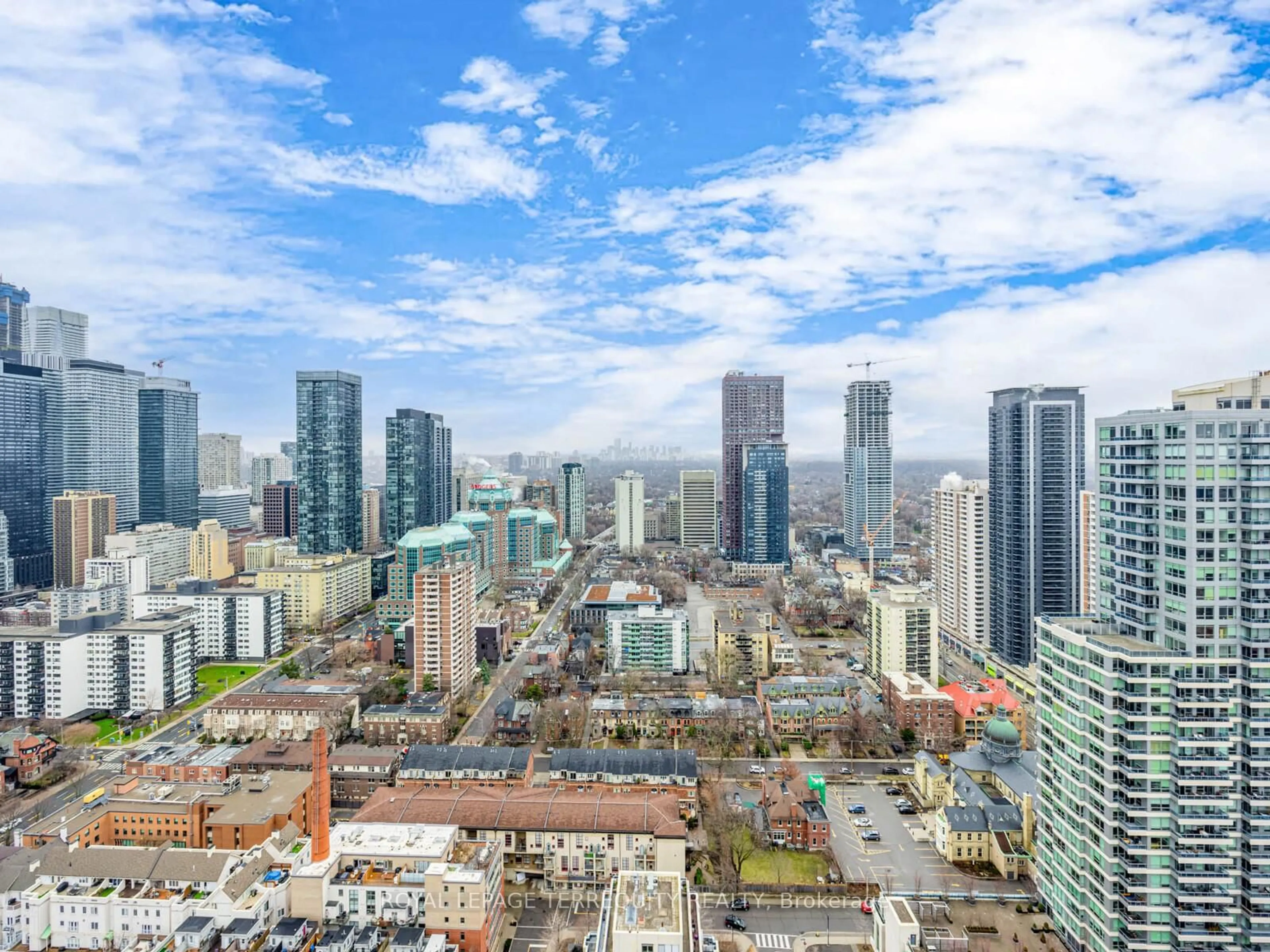 A pic from outside/outdoor area/front of a property/back of a property/a pic from drone, city buildings view from balcony for 120 Homewood Ave #3603, Toronto Ontario M4Y 2J3