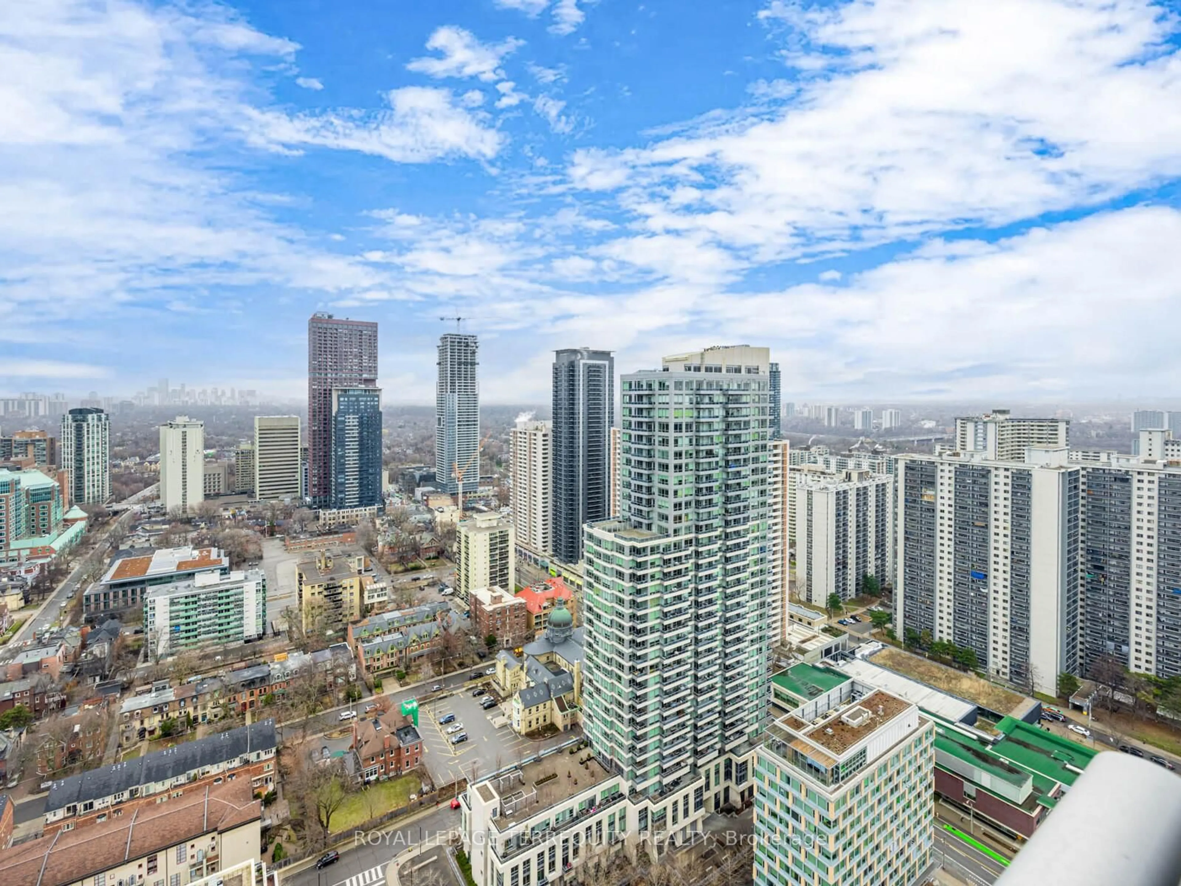 A pic from outside/outdoor area/front of a property/back of a property/a pic from drone, city buildings view from balcony for 120 Homewood Ave #3603, Toronto Ontario M4Y 2J3