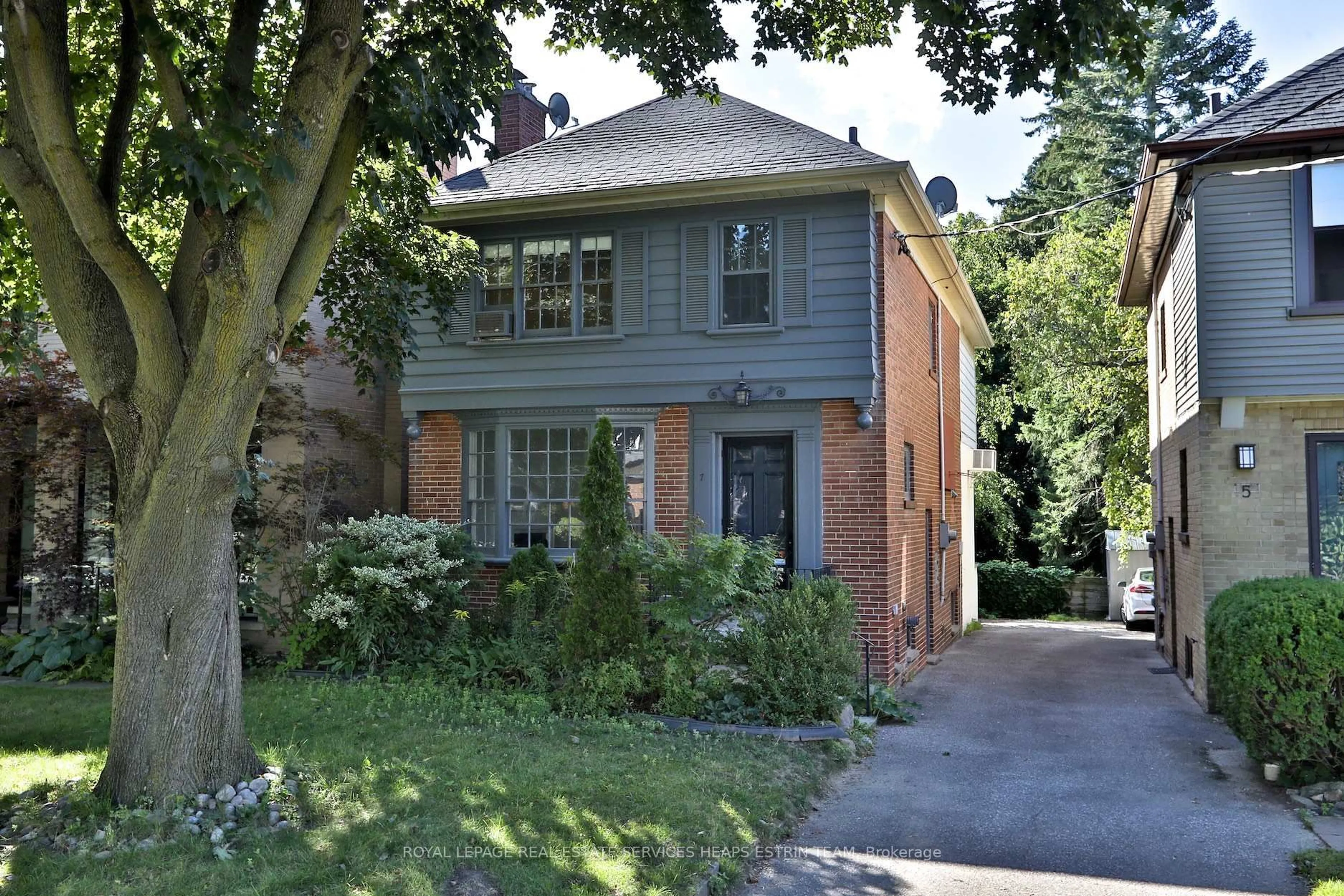 Home with brick exterior material, street for 7 Burnham Rd, Toronto Ontario M4G 1B9