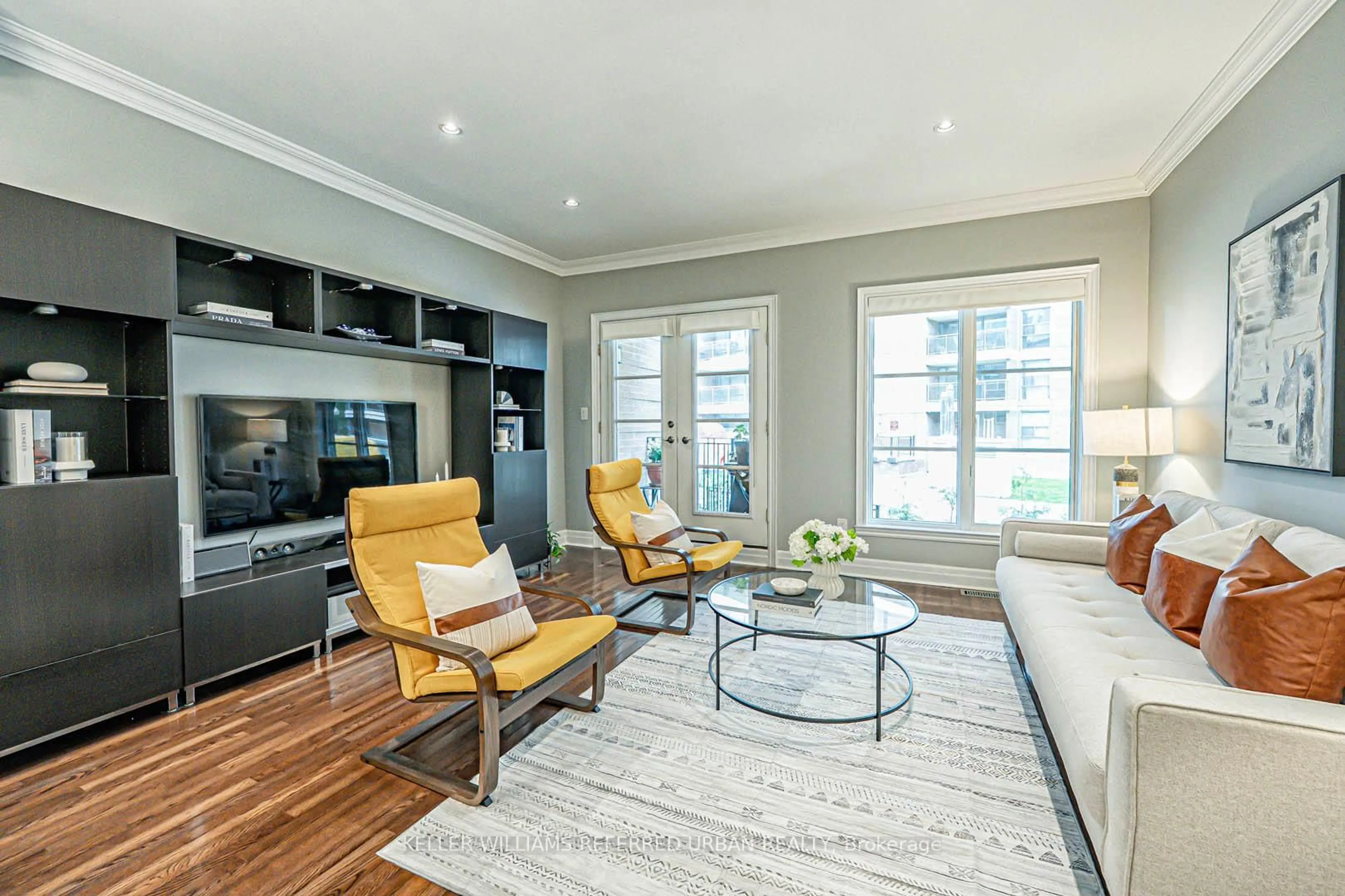 Living room with furniture, wood/laminate floor for 67 Pleasant Blvd, Toronto Ontario M4T 1K2