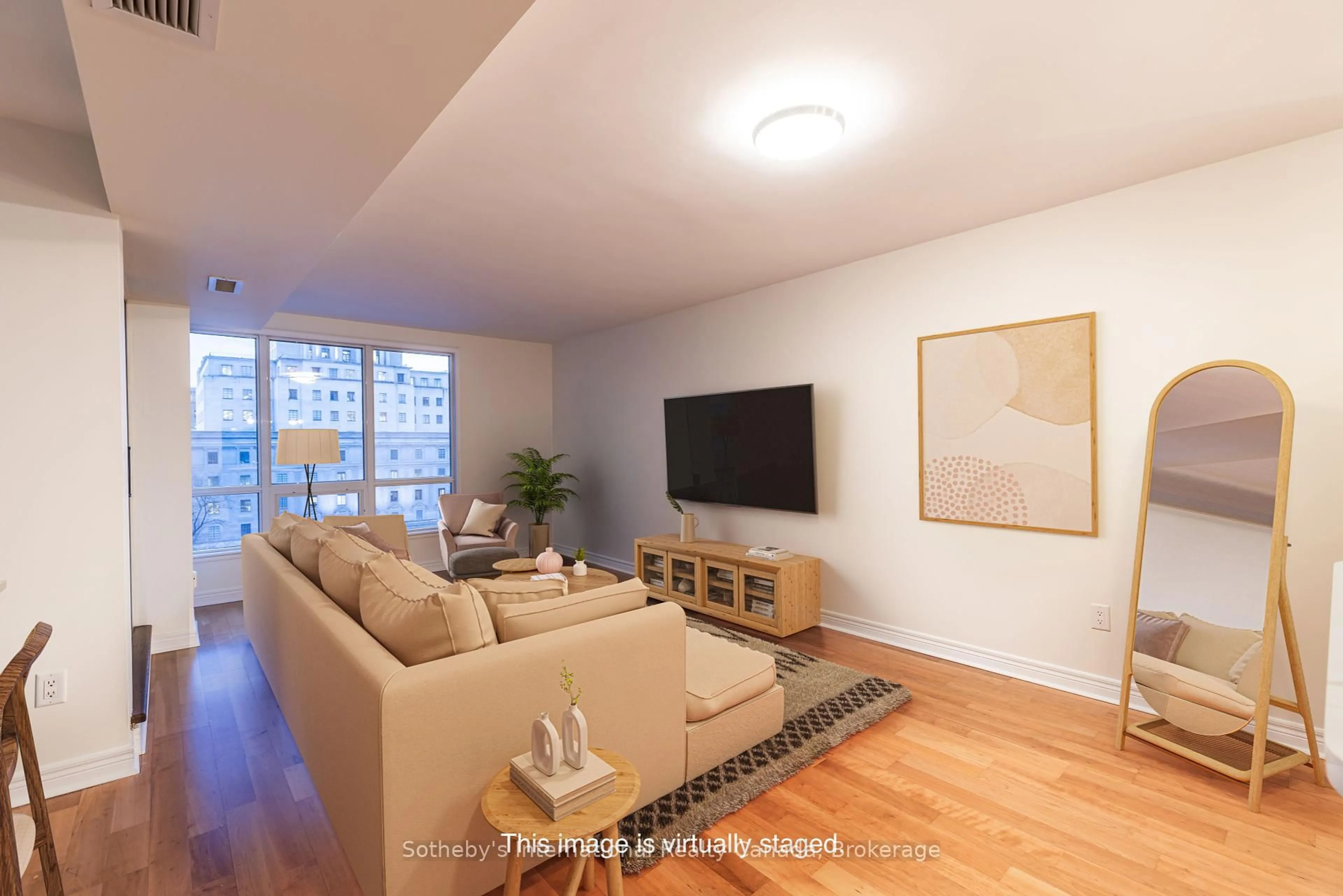 Living room with furniture, wood/laminate floor for 100 Hayden St #901, Toronto Ontario M4Y 3C7