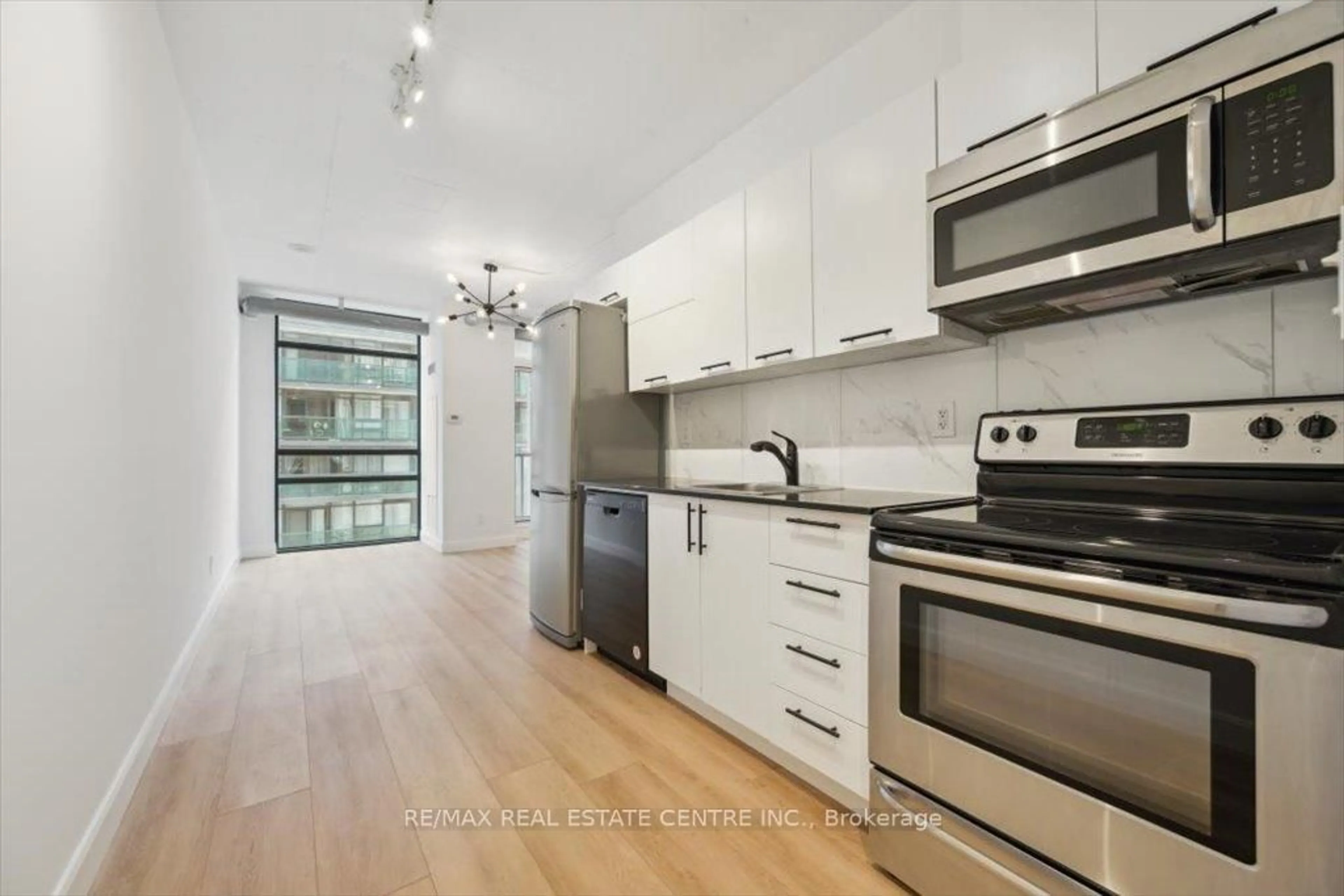 Open concept kitchen, unknown for 150 Sudbury St #1407, Toronto Ontario M6J 3S8
