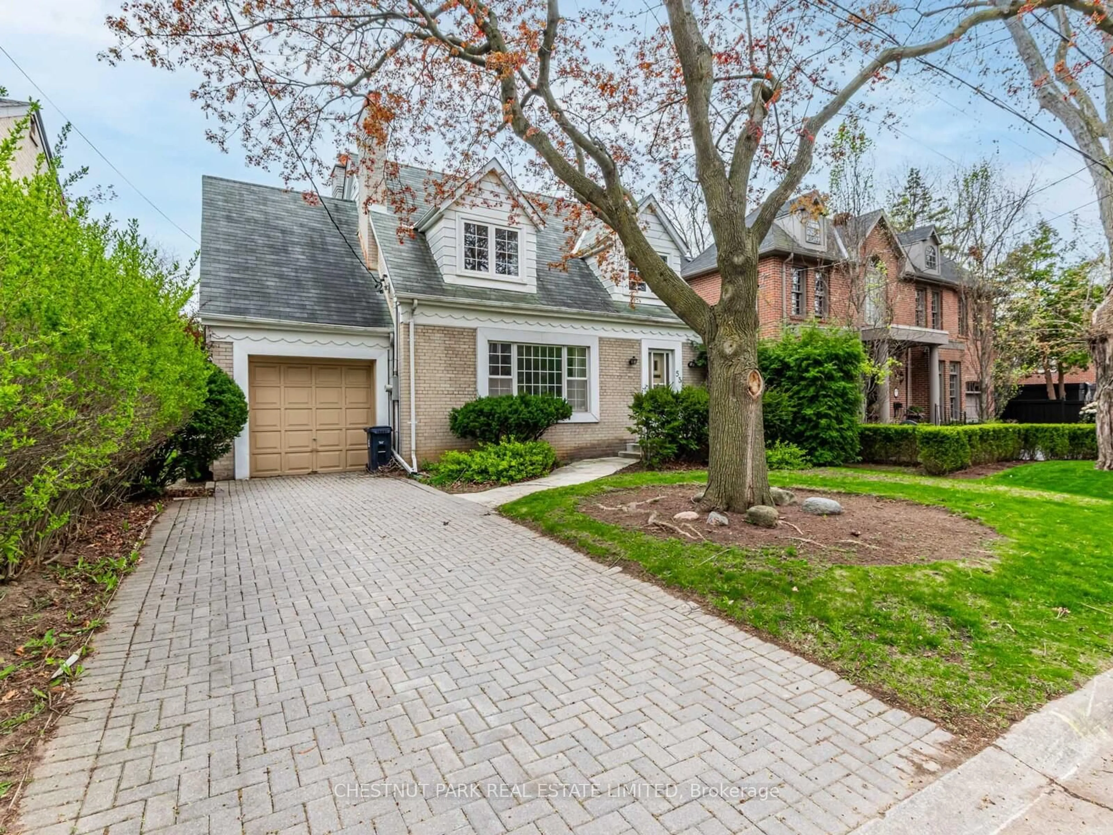 Home with brick exterior material, street for 53 Caribou Rd, Toronto Ontario M5N 2A6