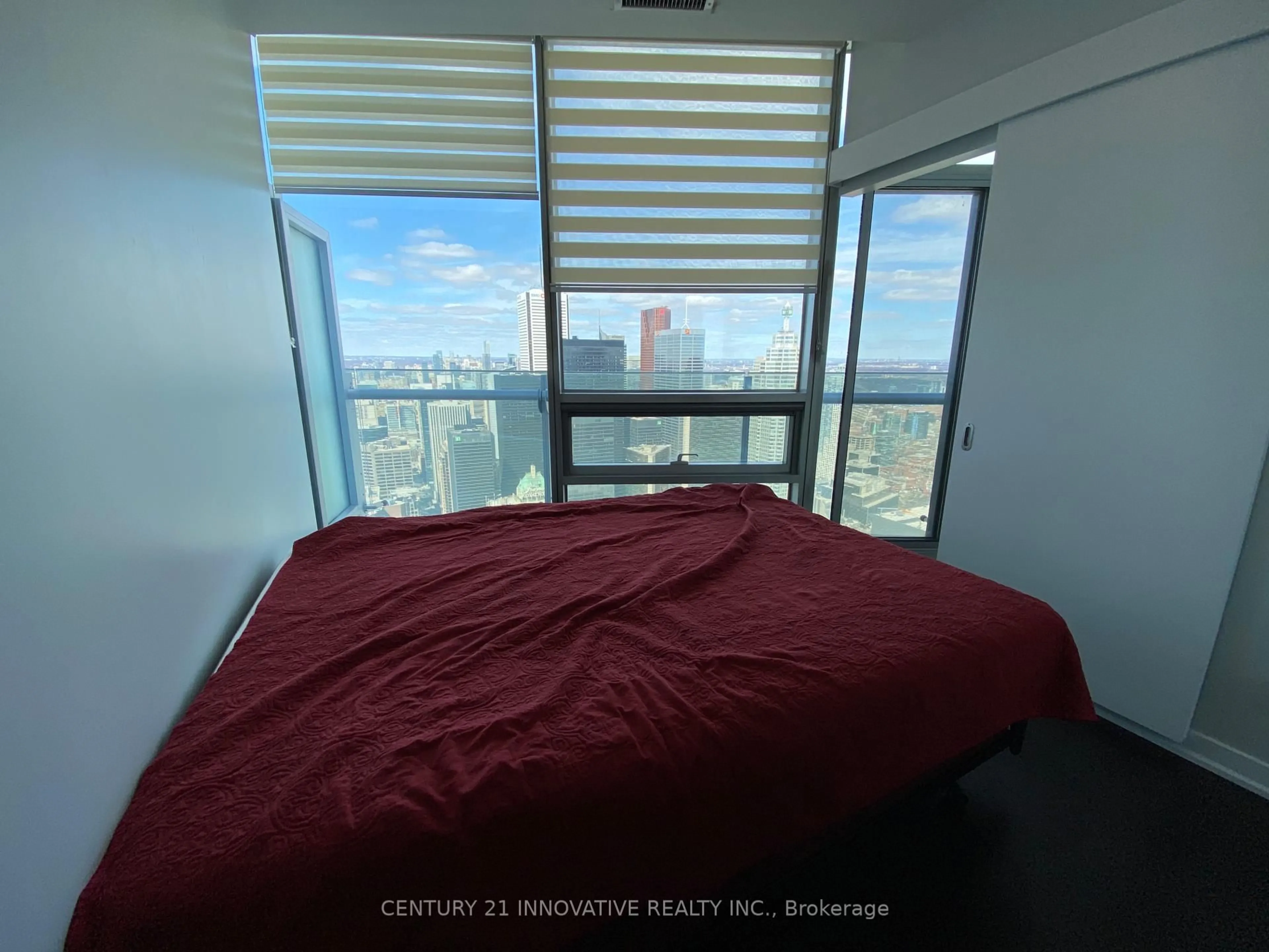 Bedroom with bed, floor is not visible for 14 York St #6711, Toronto Ontario M5J 0B1