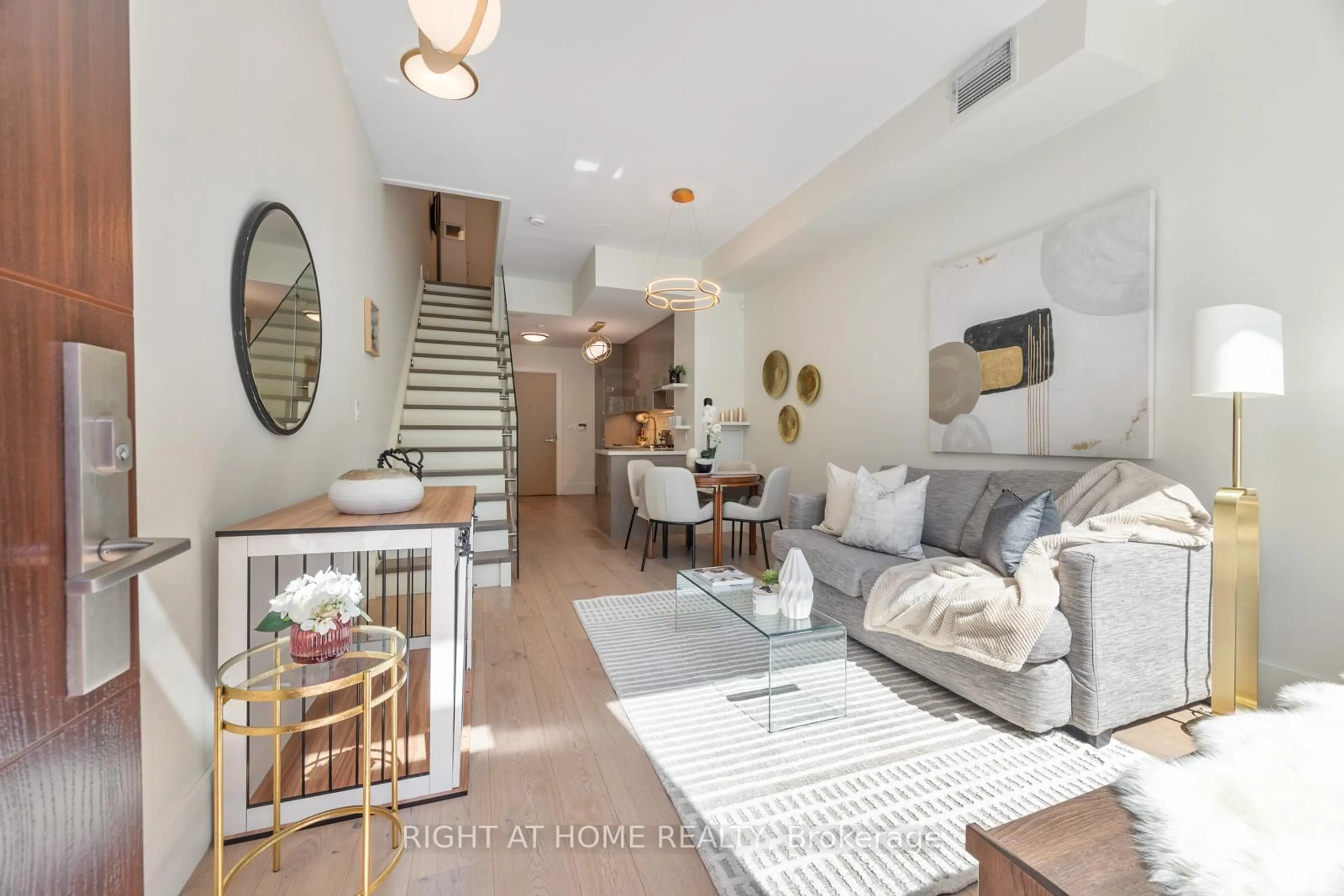 Living room with furniture, unknown for 39 Queens Quay #129, Toronto Ontario M5E 0A5