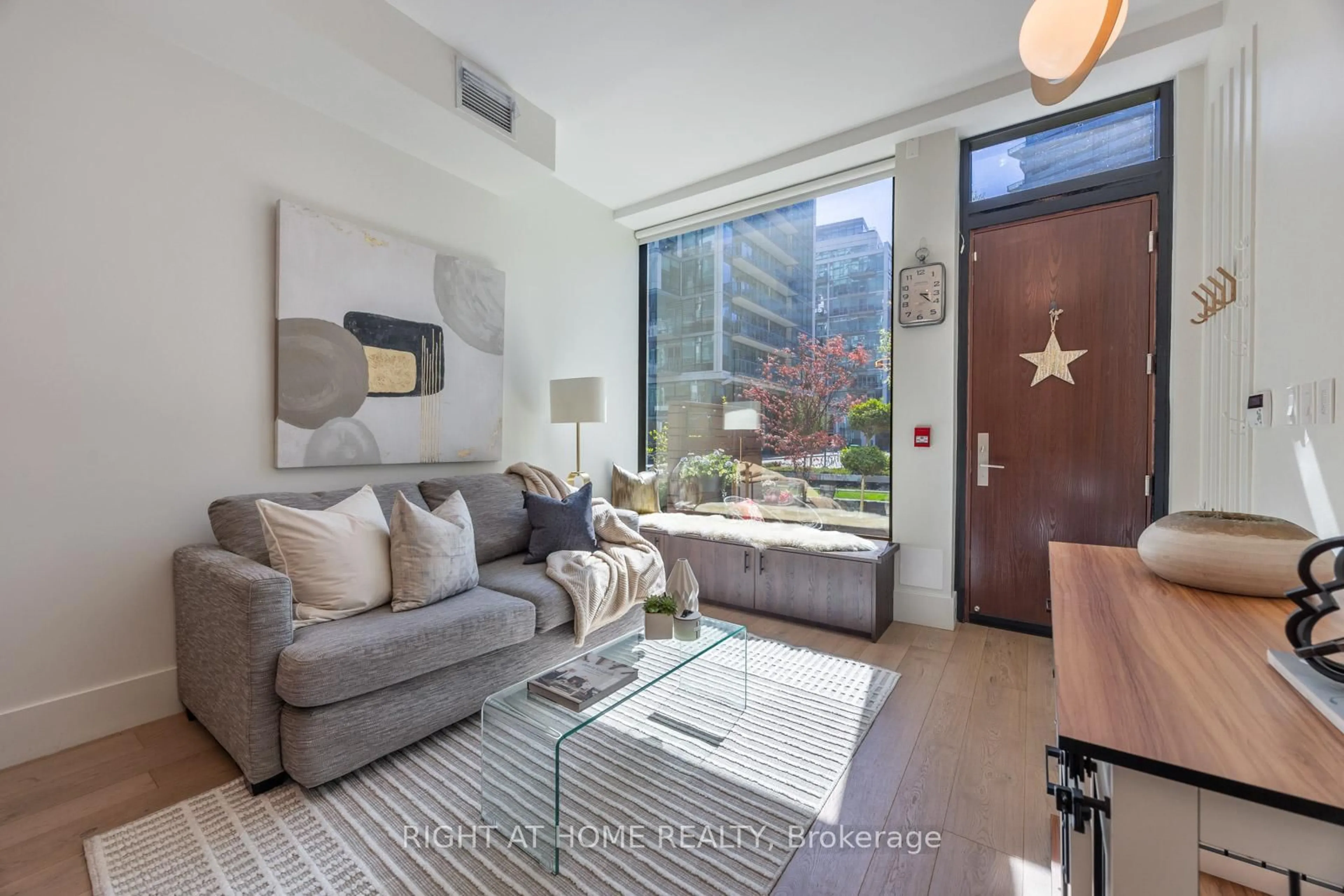 Living room with furniture, unknown for 39 Queens Quay #129, Toronto Ontario M5E 0A5