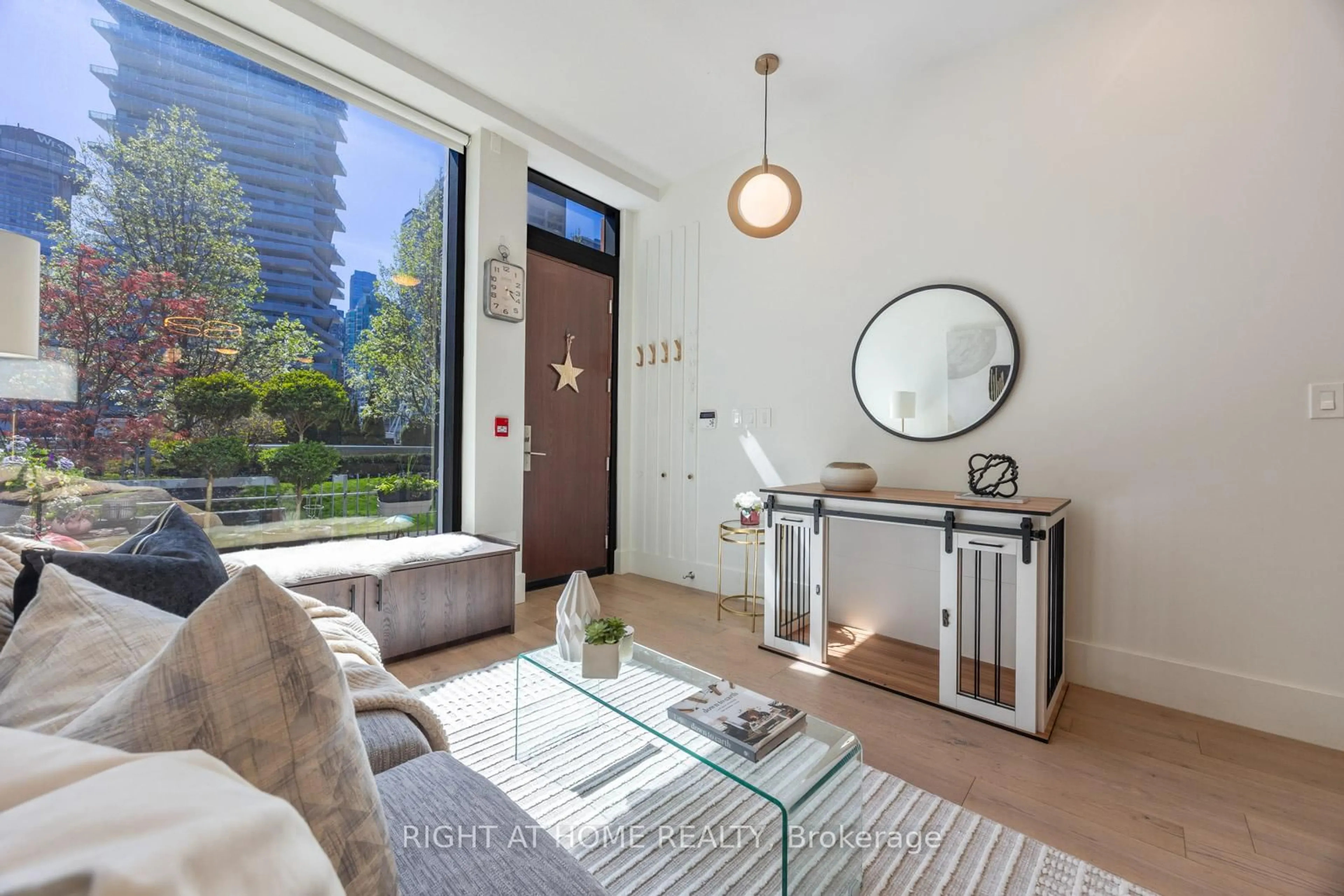 Living room with furniture, unknown for 39 Queens Quay #129, Toronto Ontario M5E 0A5
