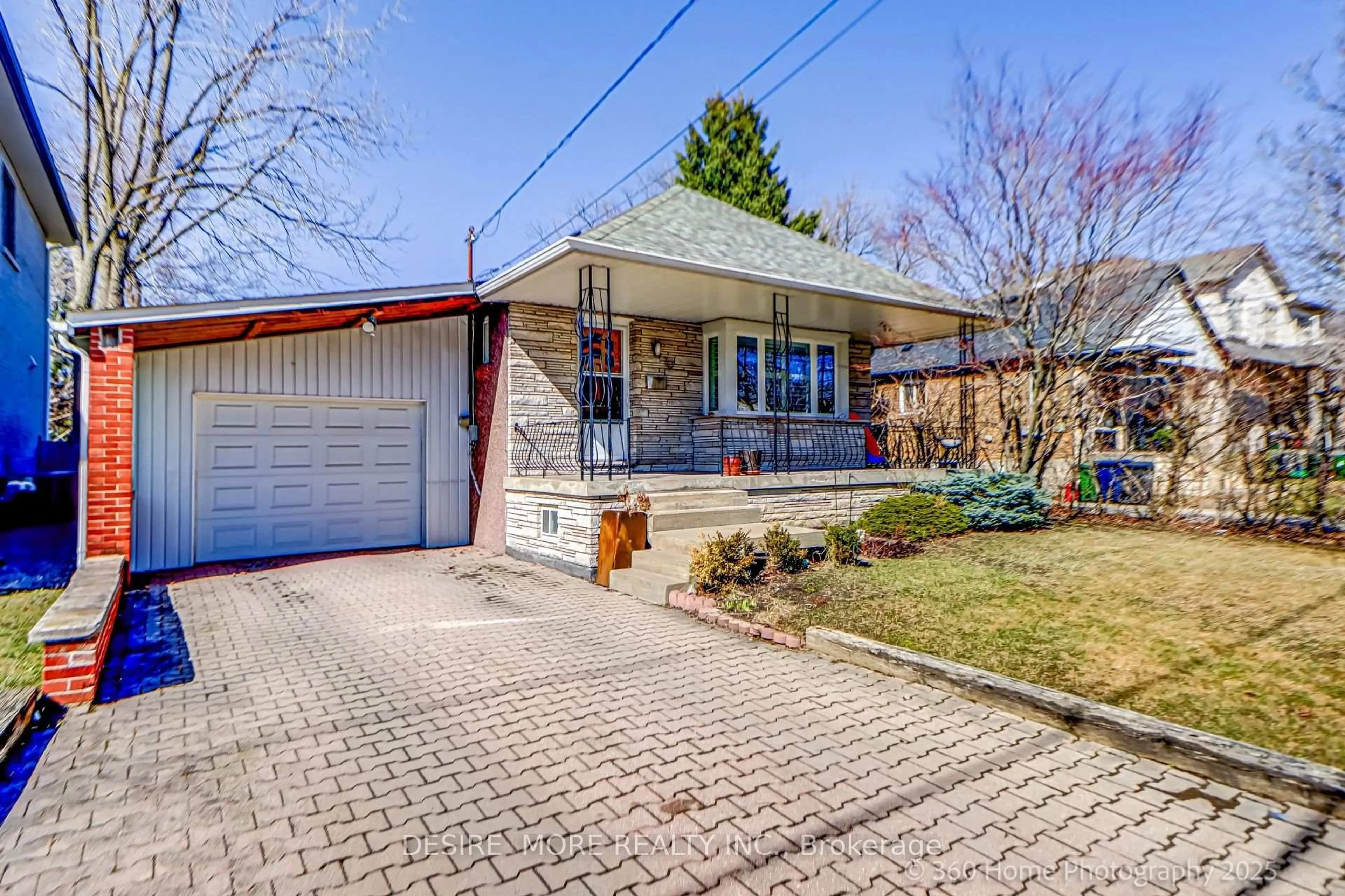 Home with brick exterior material, street for 70 Ridgevale Dr, Toronto Ontario M6A 1L1