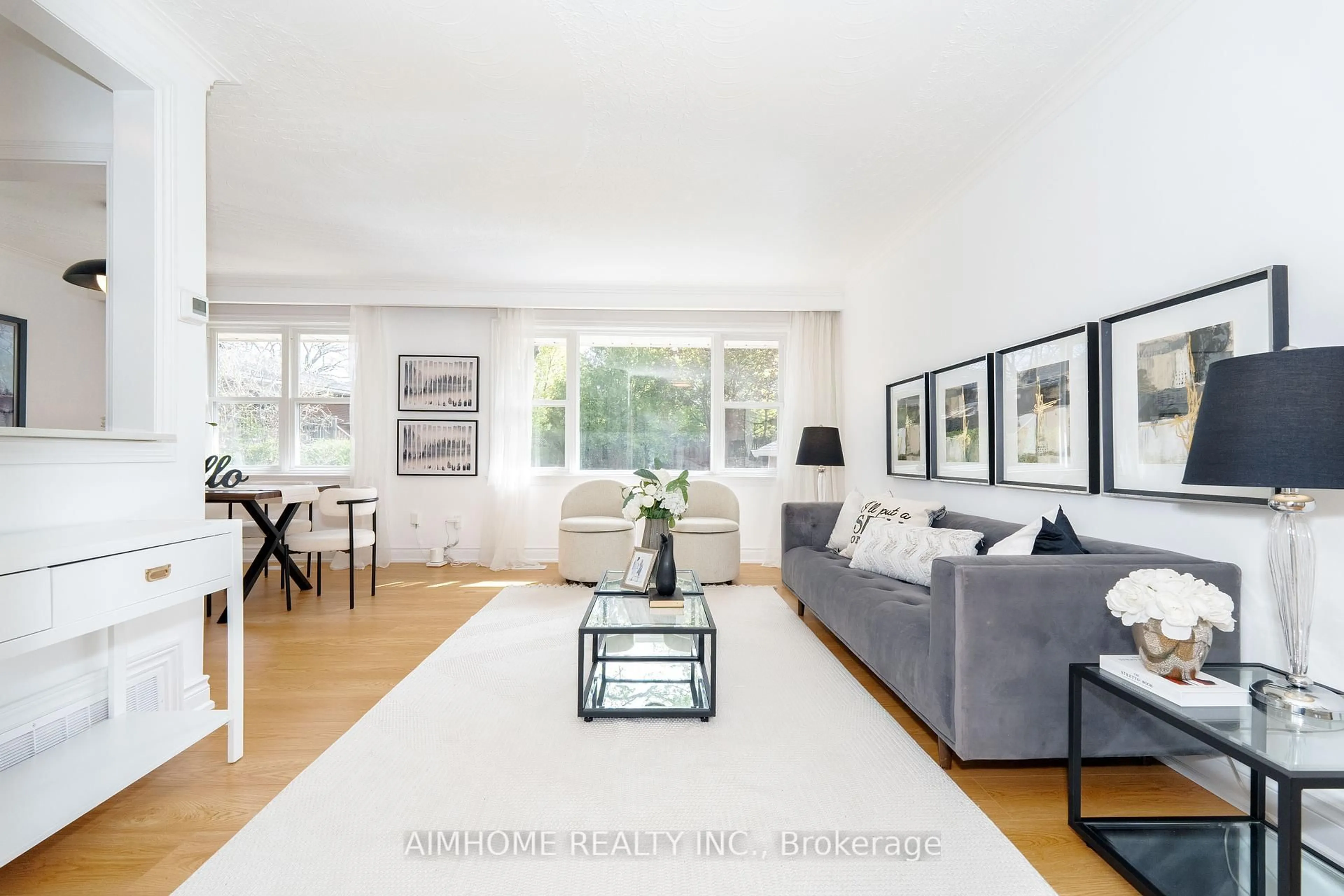 Living room with furniture, unknown for 145 Sloane Ave, Toronto Ontario M4A 2B8
