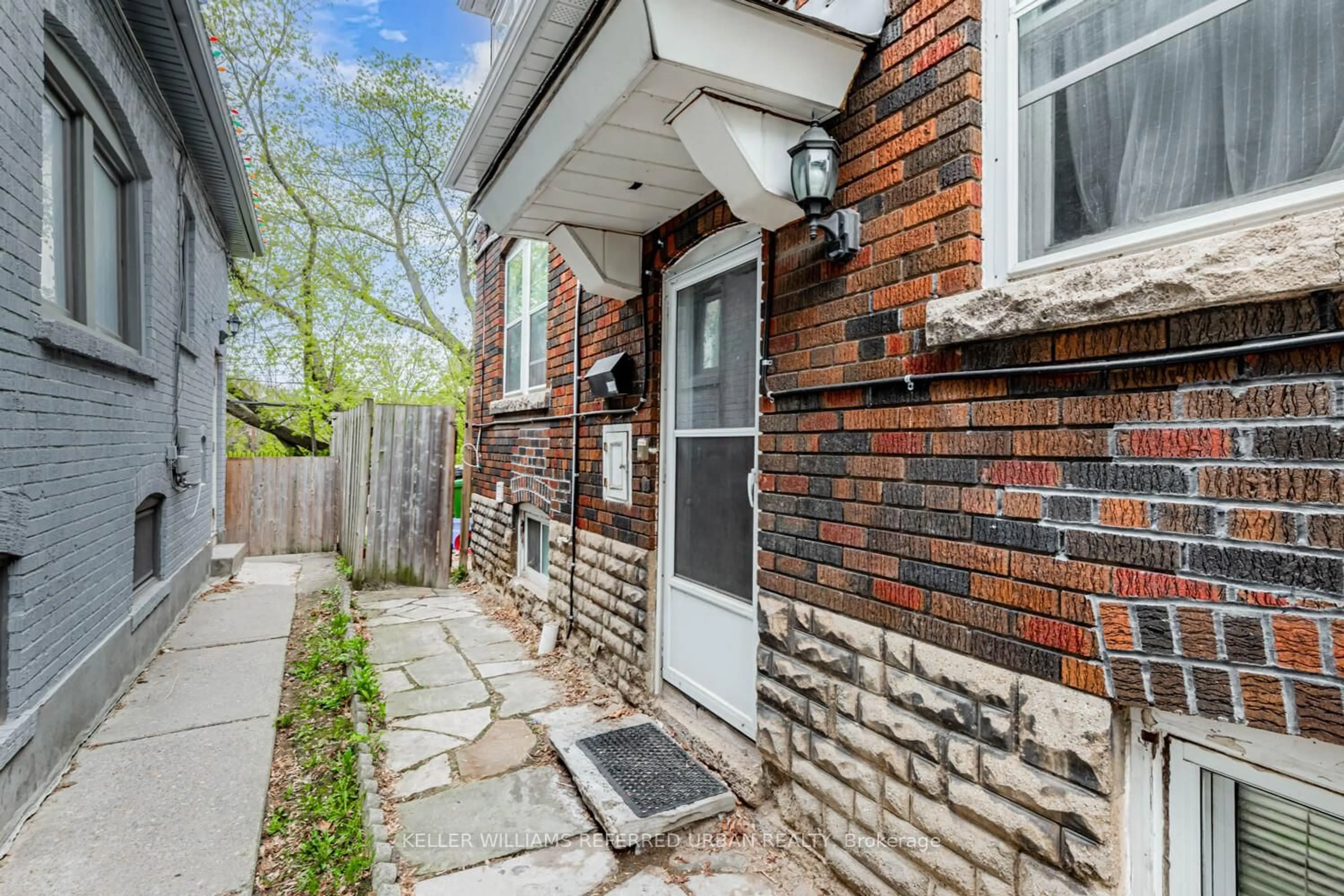 Home with brick exterior material, street for 244 Winona Dr, Toronto Ontario M6C 3S2