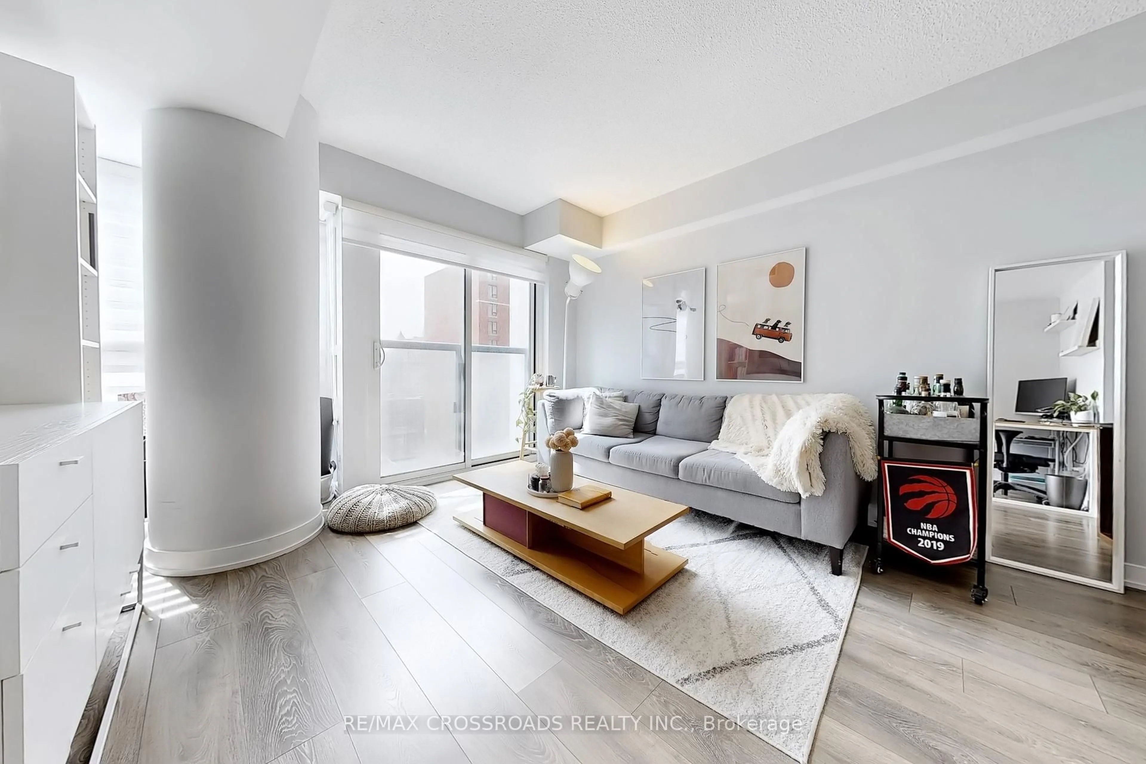 Living room with furniture, wood/laminate floor for 87 Peter St #1005, Toronto Ontario M5V 0P1