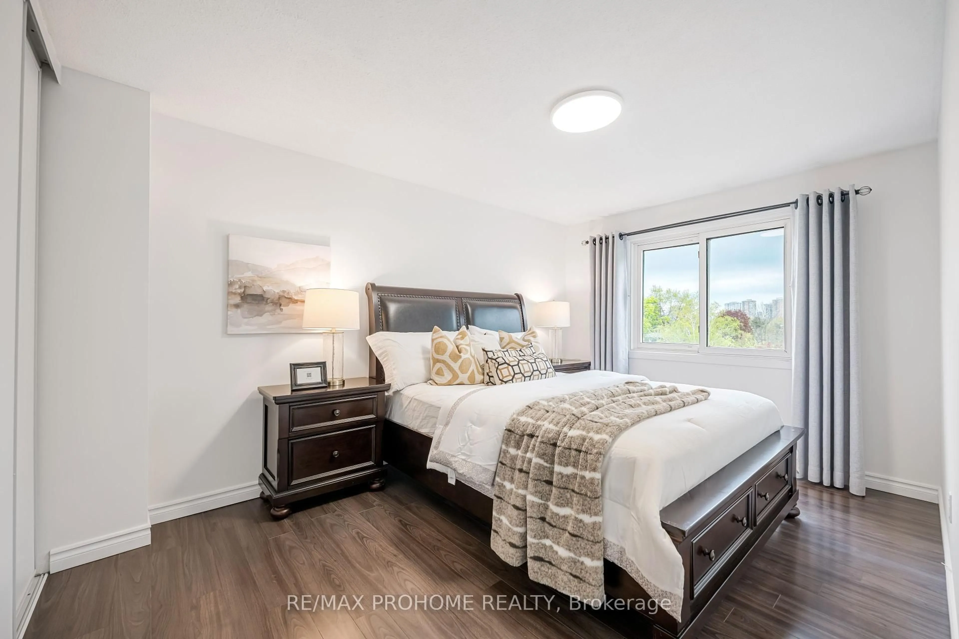 Bedroom with bed, wood/laminate floor for 80 Purple Sageway N/A, Toronto Ontario M2H 2Z7