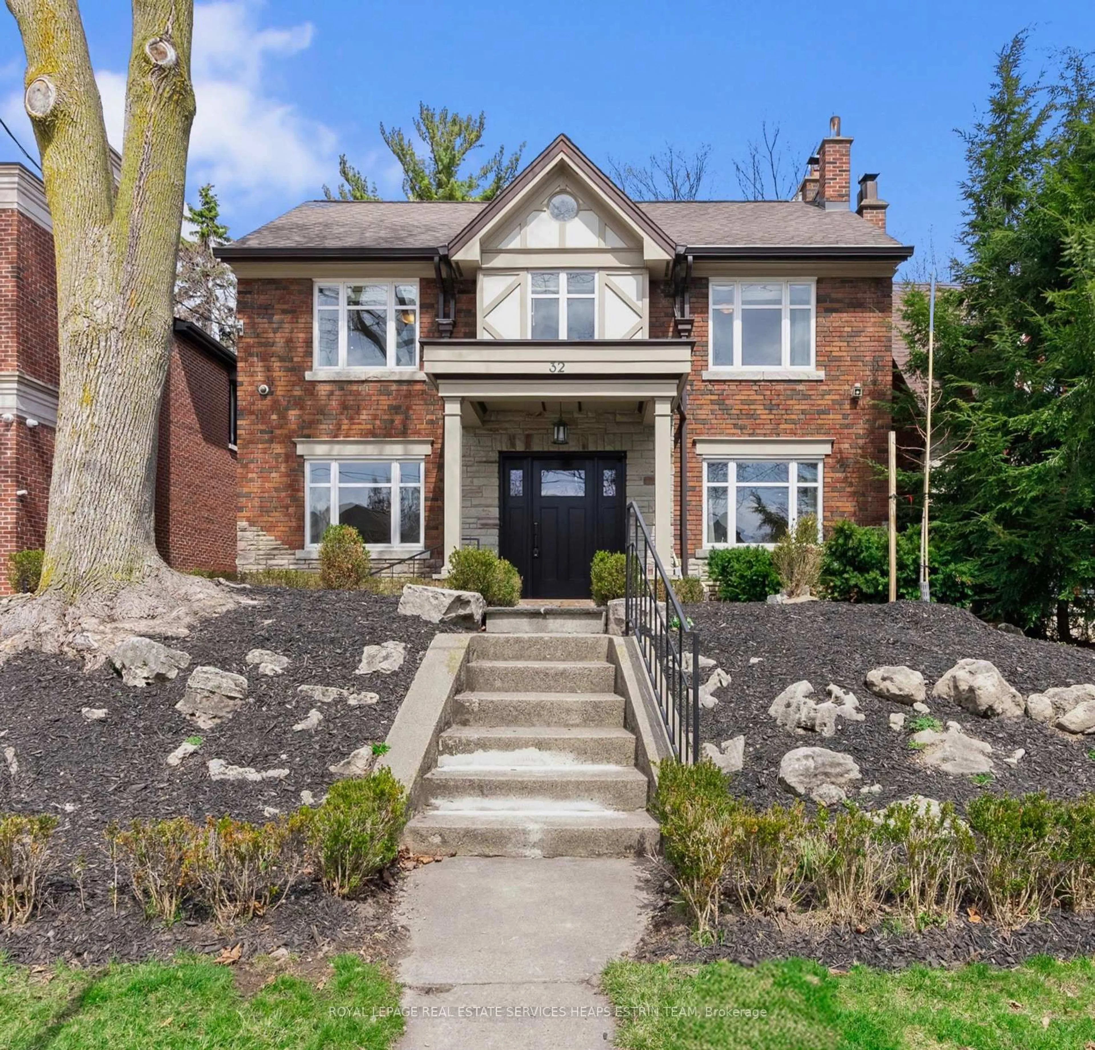 Home with brick exterior material, street for 32 Parkhurst Blvd, Toronto Ontario M4G 2C6
