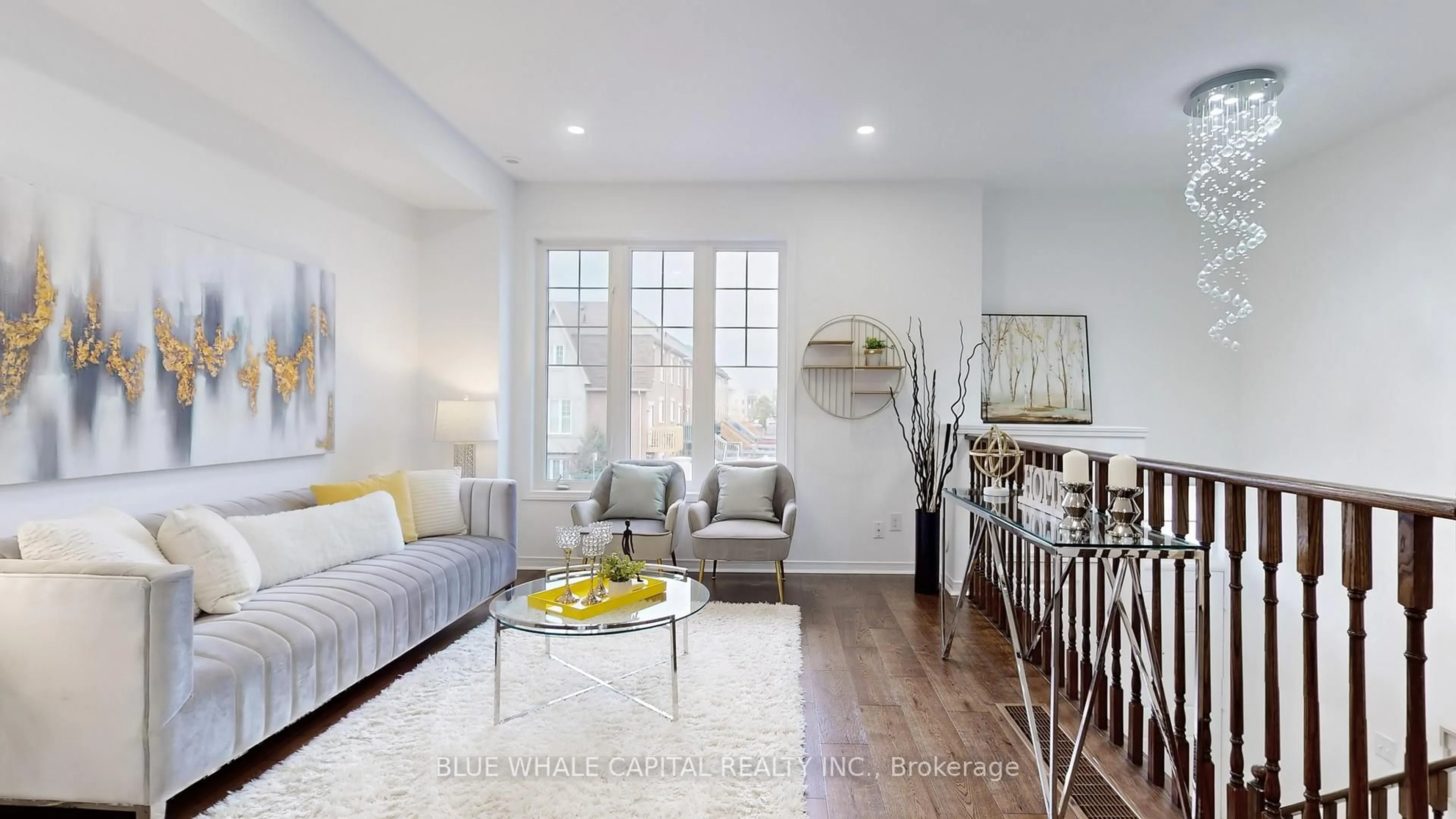 Living room with furniture, wood/laminate floor for 21 Collip Pl, Toronto Ontario M4A 0A3