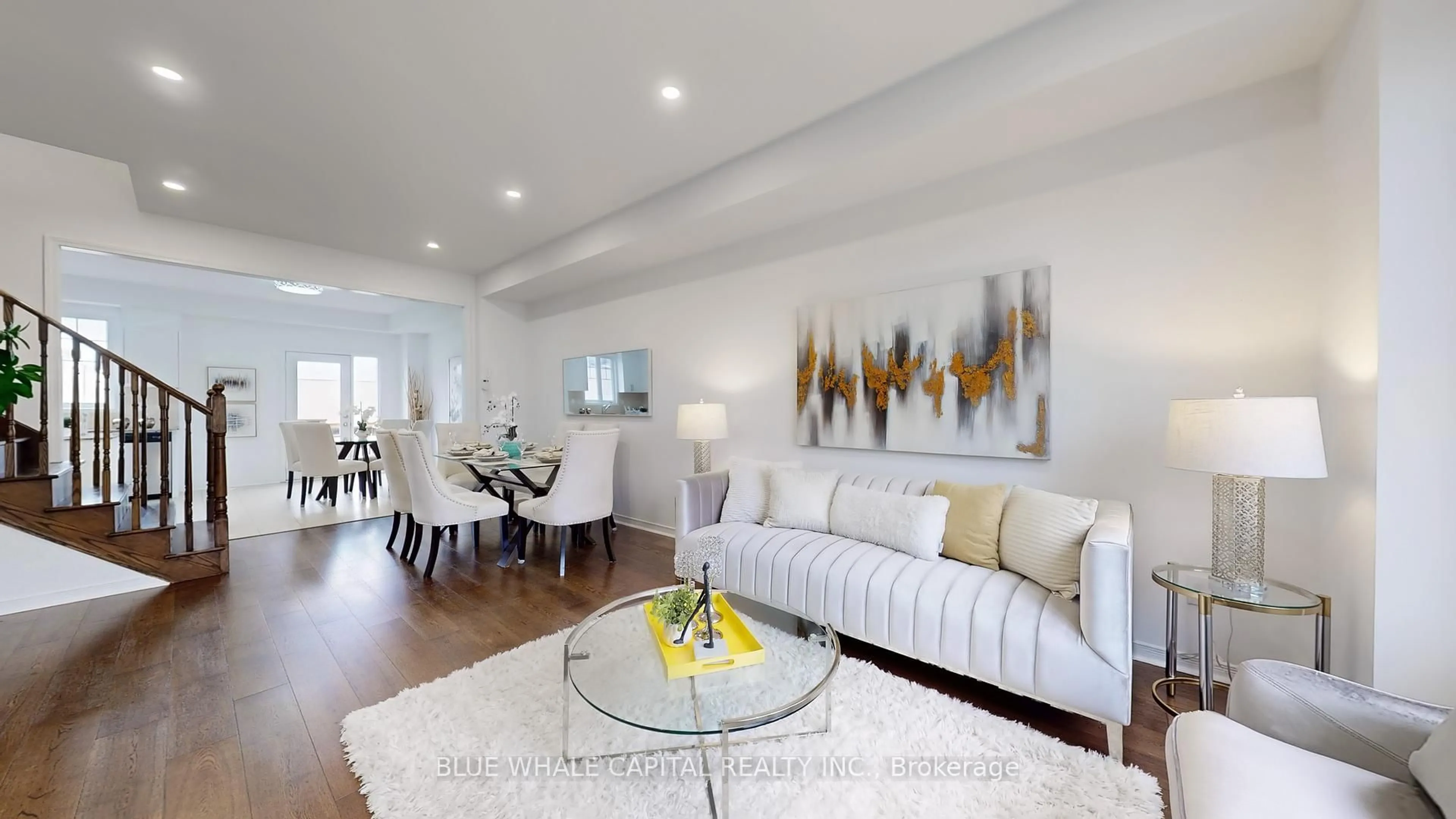 Living room with furniture, wood/laminate floor for 21 Collip Pl, Toronto Ontario M4A 0A3