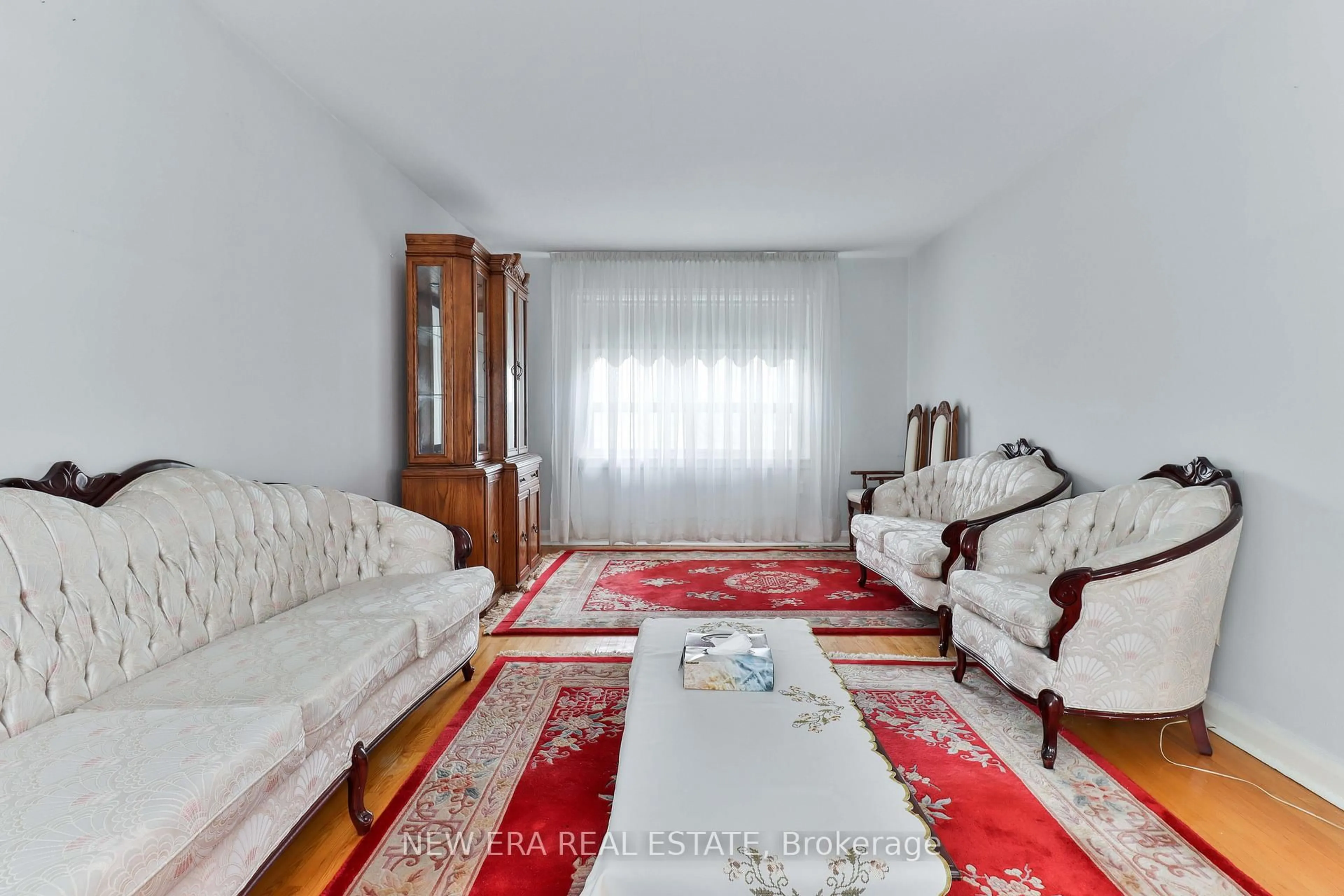 Living room with furniture, carpet floor for 27 Dell Park Ave, Toronto Ontario M6B 2T5