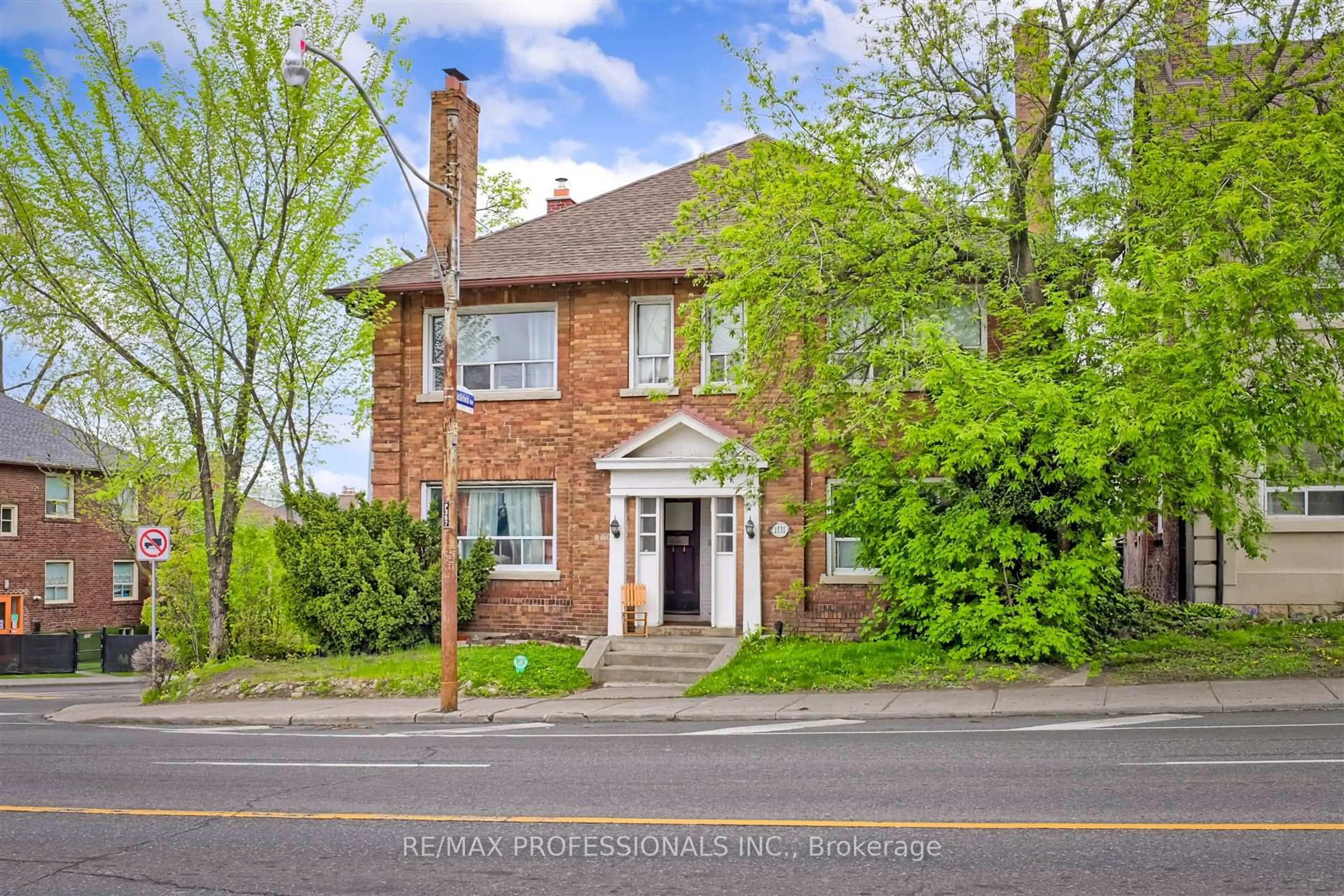 Home with brick exterior material, street for 1131 & 1131A Avenue Rd, Toronto Ontario M5N 2E5