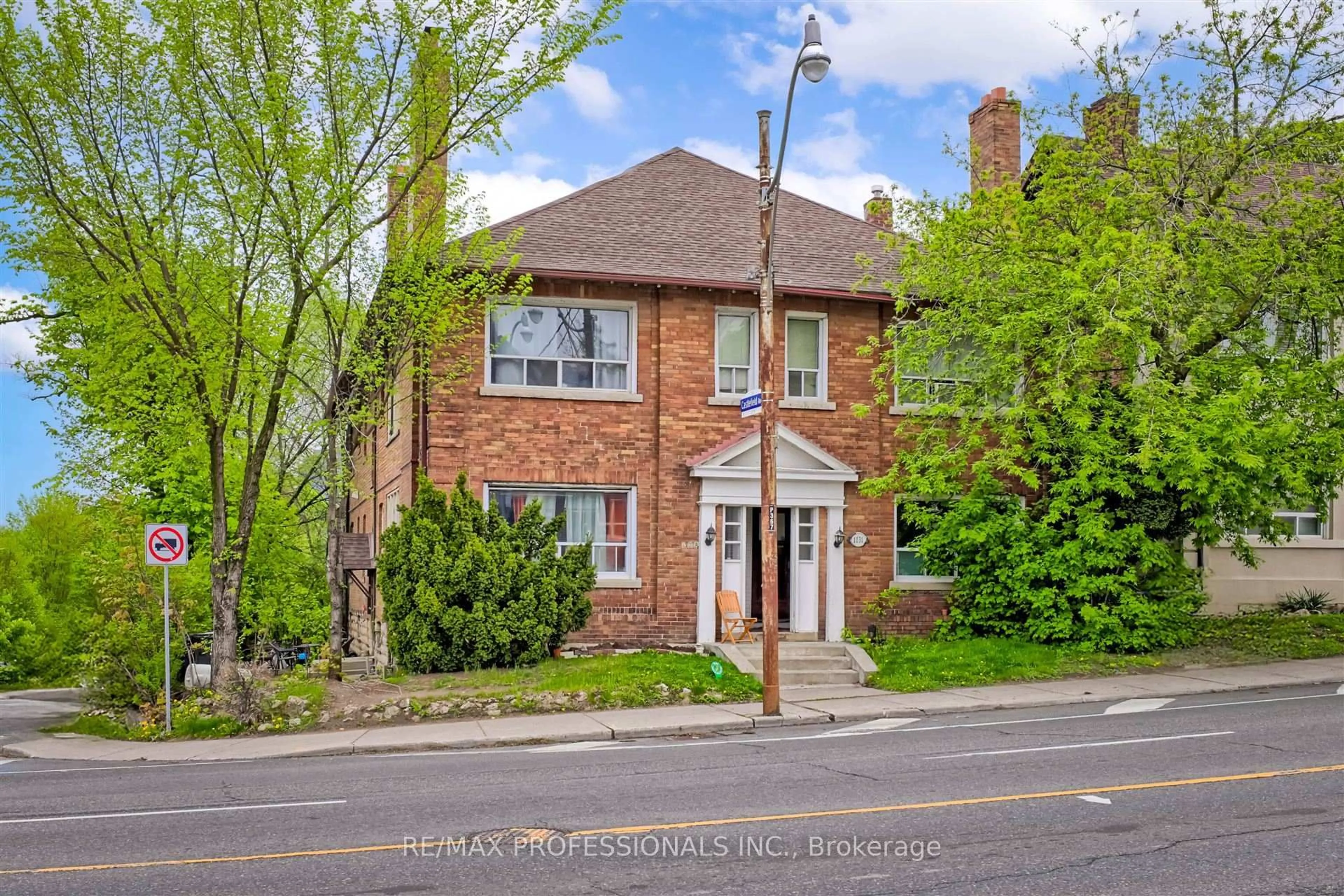 Home with brick exterior material, street for 1131 & 1131A Avenue Rd, Toronto Ontario M5N 2E5