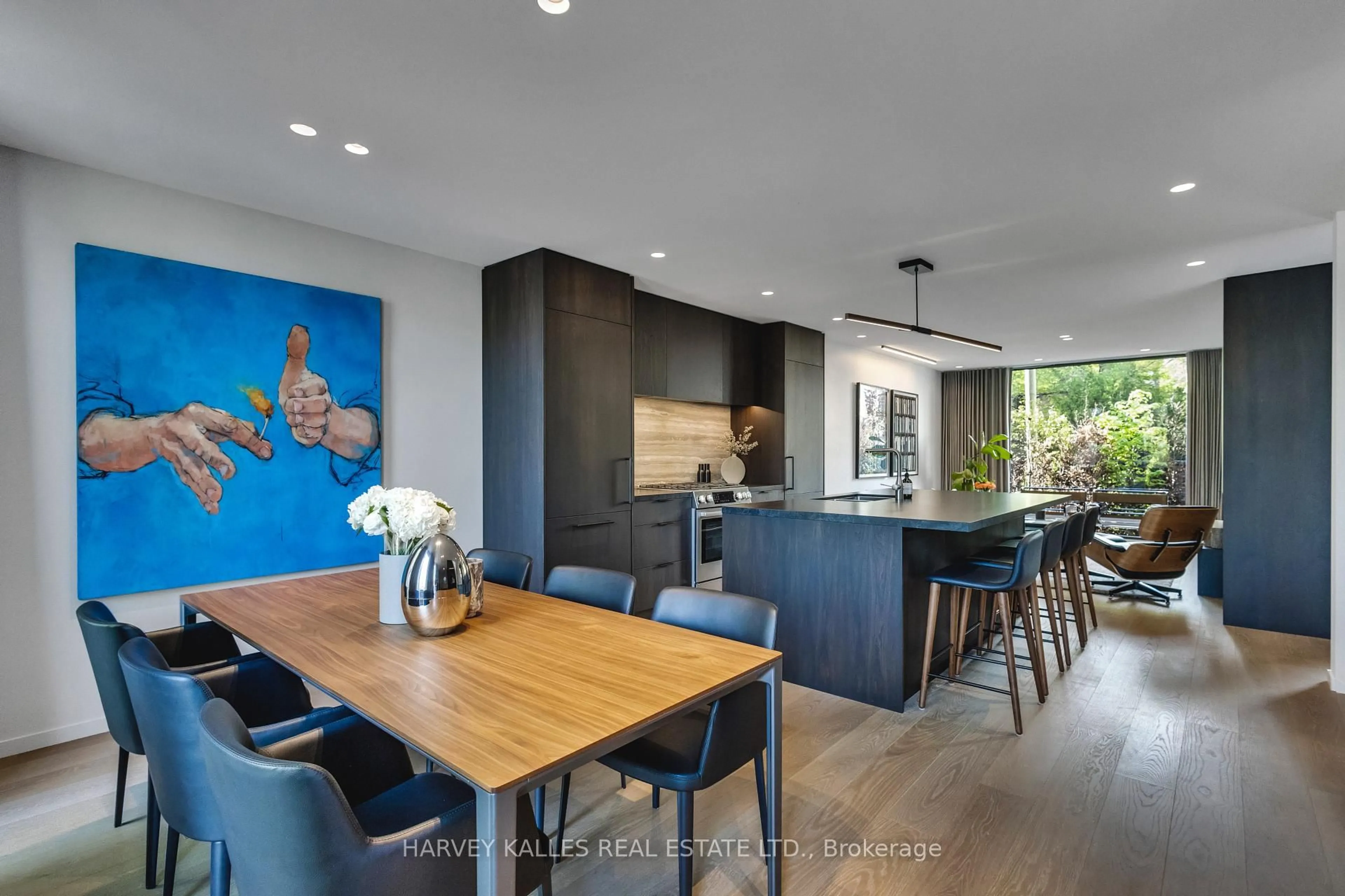 Open concept kitchen, wood/laminate floor for 60 Follis Ave, Toronto Ontario M6G 1S6