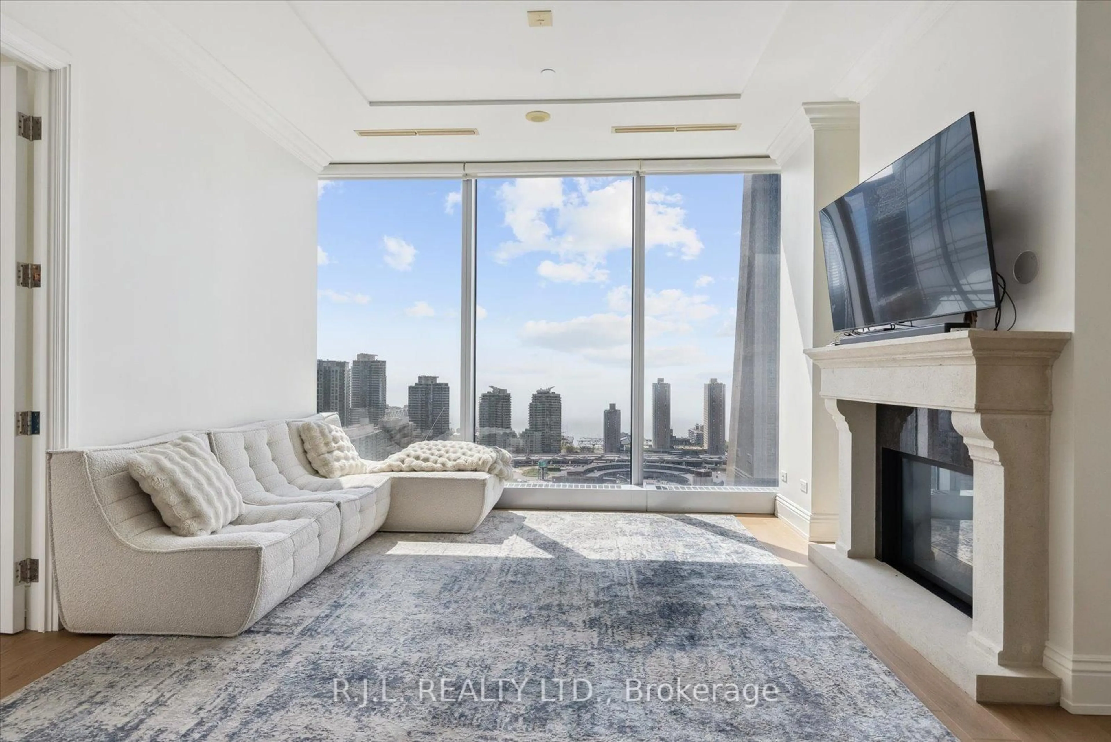 Living room with furniture, carpet floor for 183 Wellington St #2505, Toronto Ontario M5V 0A1