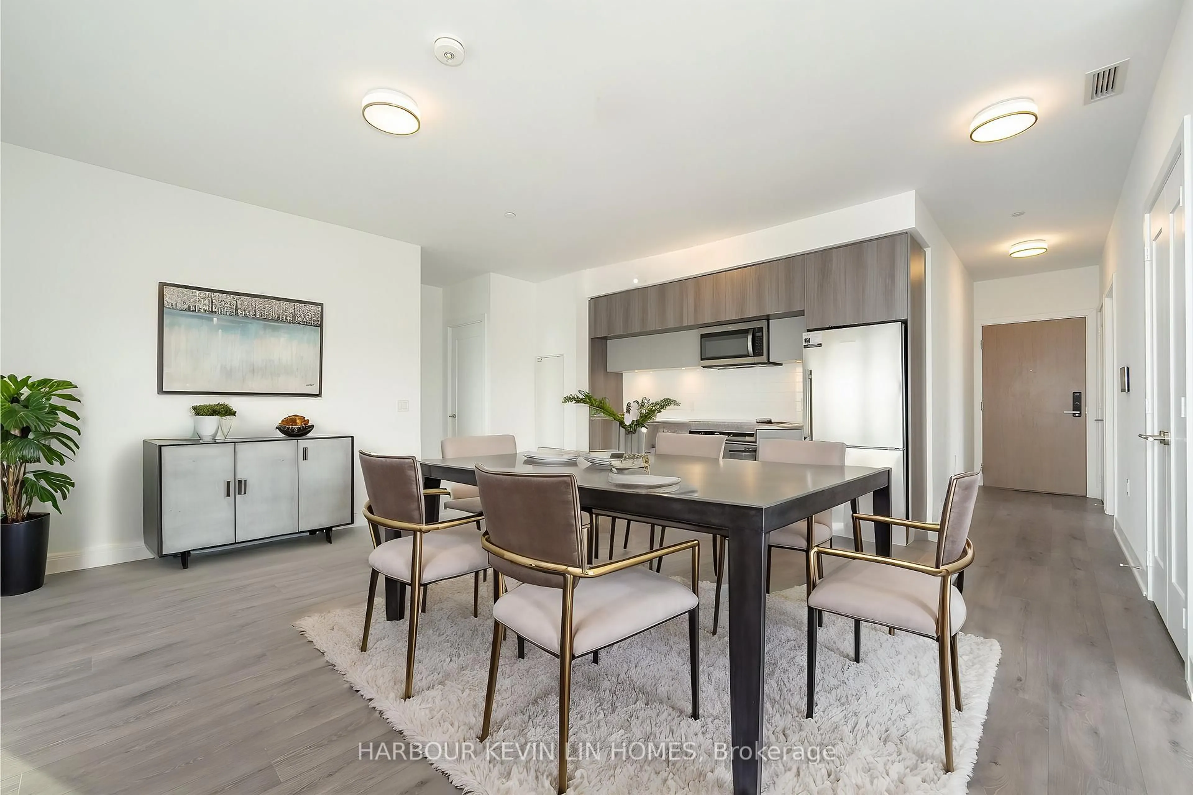 Open concept kitchen, wood/laminate floor for 575 Bloor St #2703, Toronto Ontario M4W 0B2