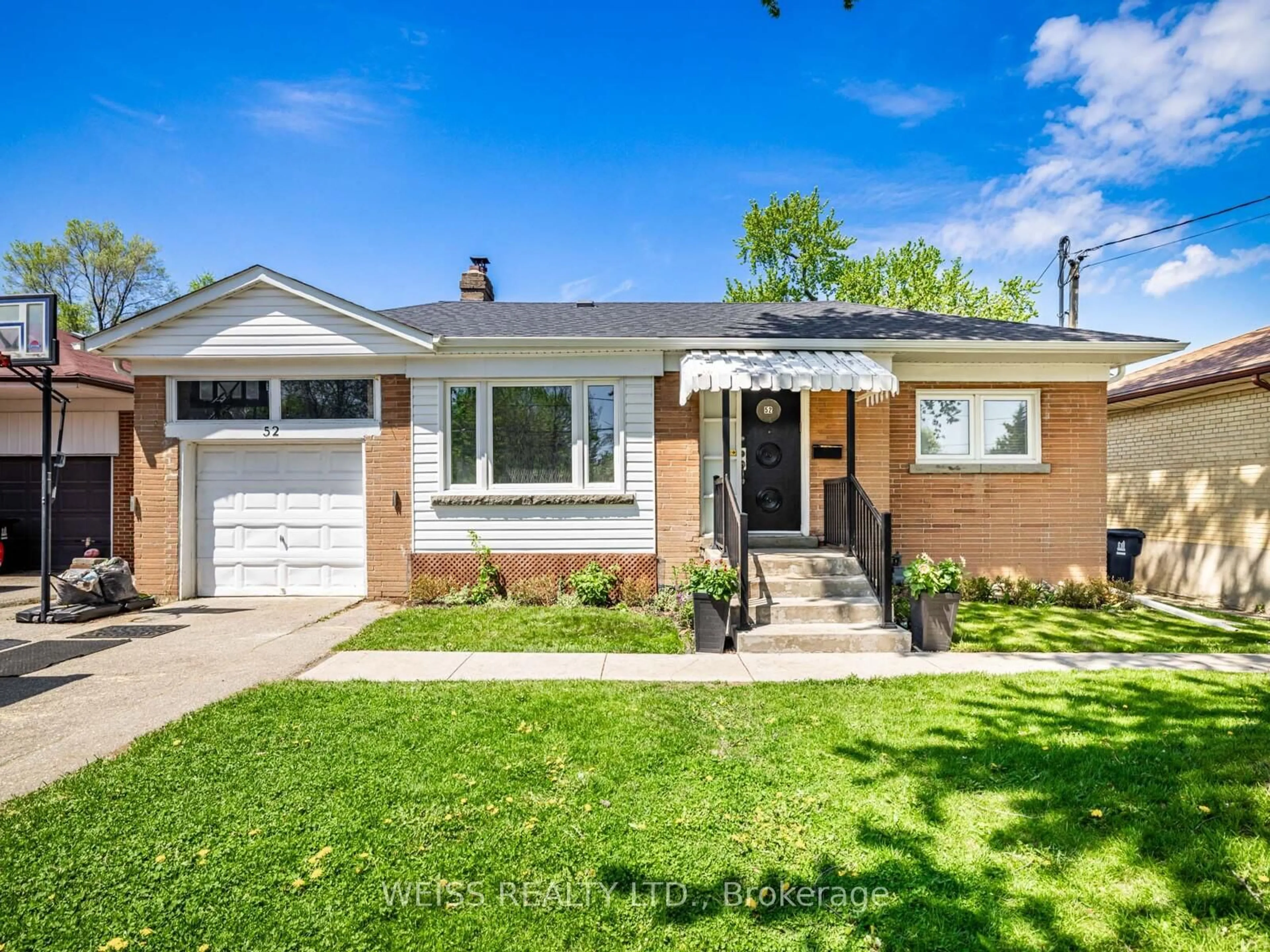 Home with brick exterior material, street for 52 Almore Ave, Toronto Ontario M3H 2H2
