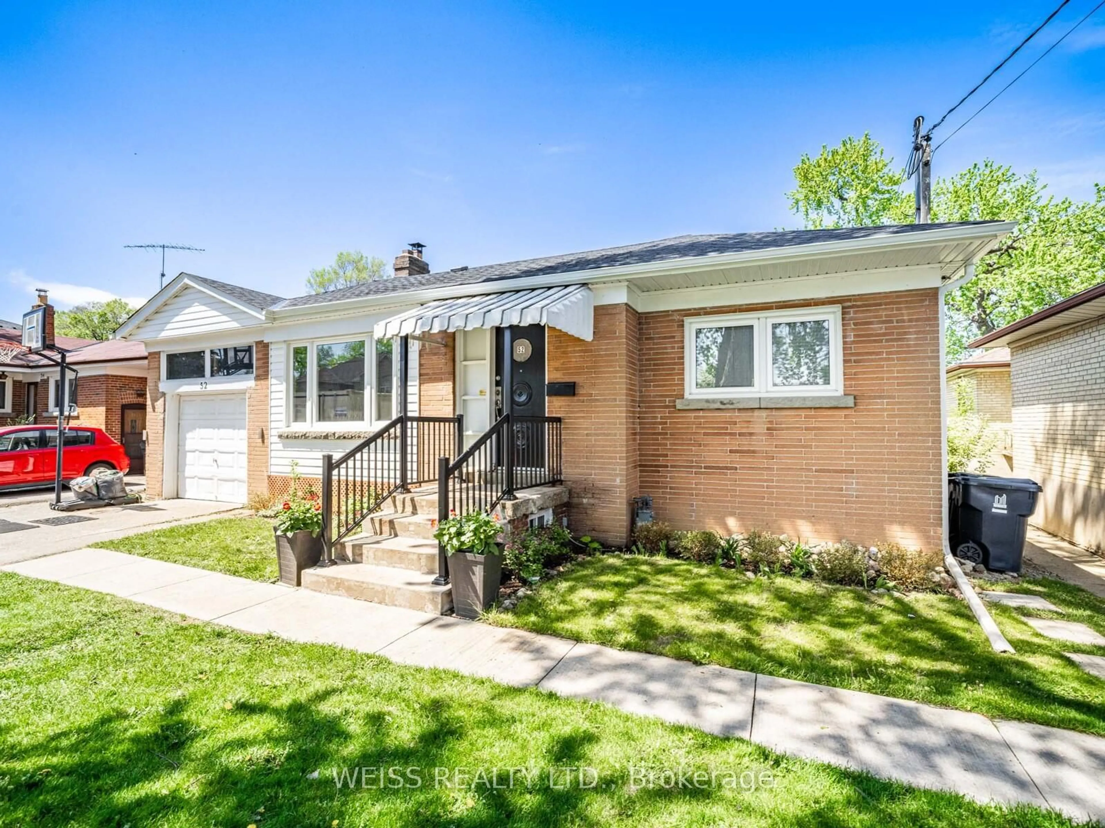 Home with brick exterior material, street for 52 Almore Ave, Toronto Ontario M3H 2H2