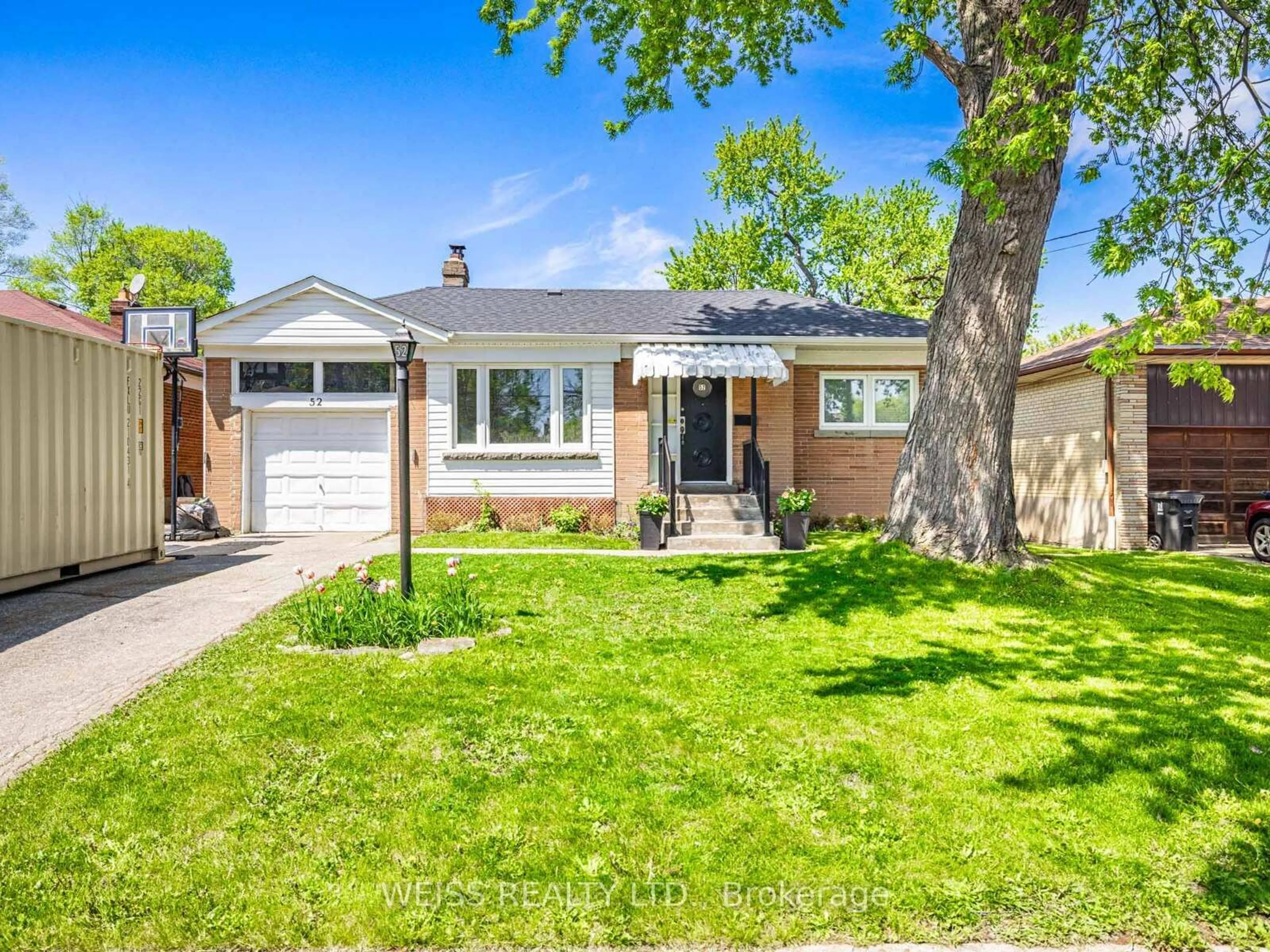 Home with brick exterior material, street for 52 Almore Ave, Toronto Ontario M3H 2H2