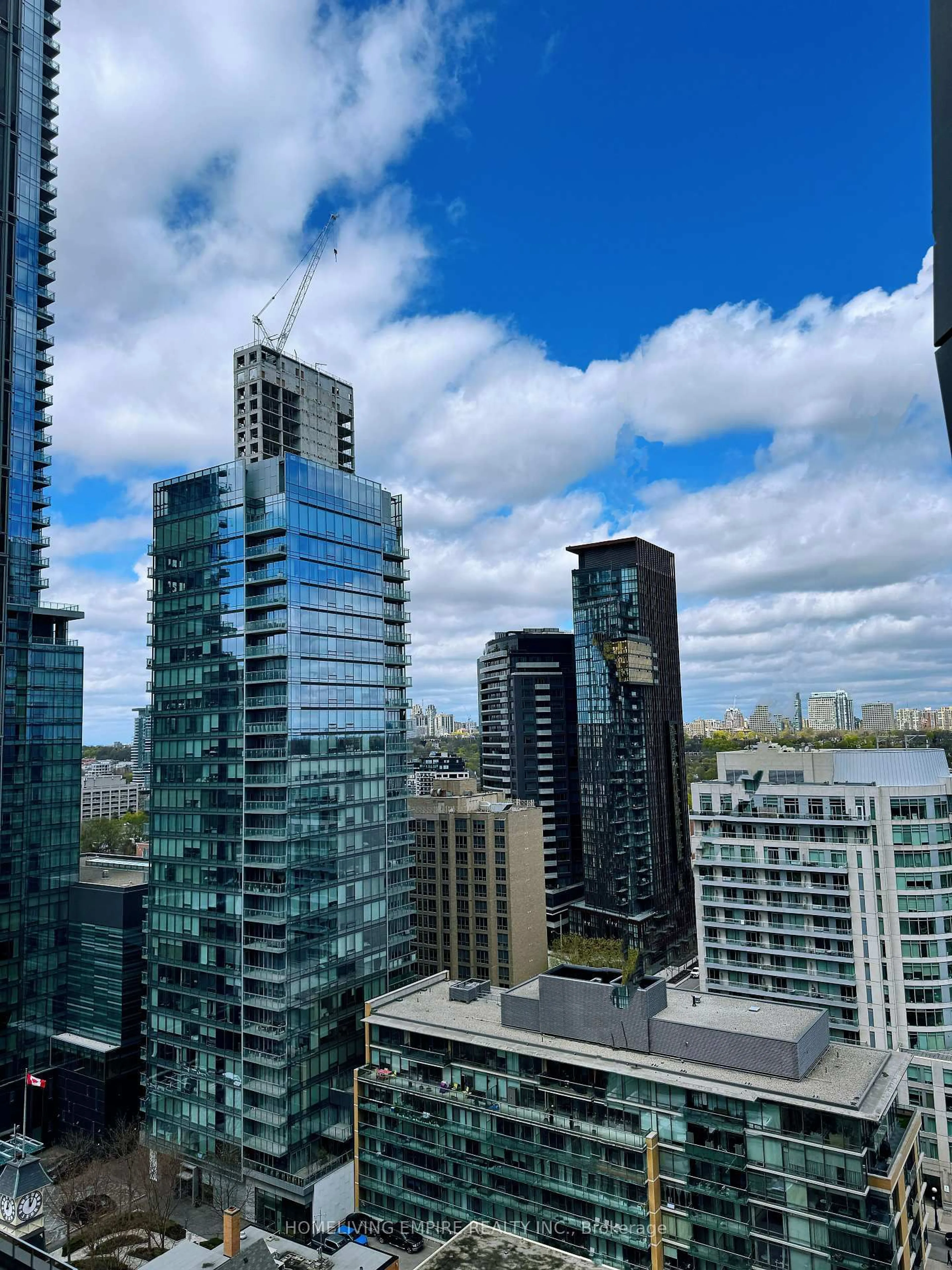 A pic from outside/outdoor area/front of a property/back of a property/a pic from drone, city buildings view from balcony for 1 Yorkville Ave #1703, Toronto Ontario M4W 1L1