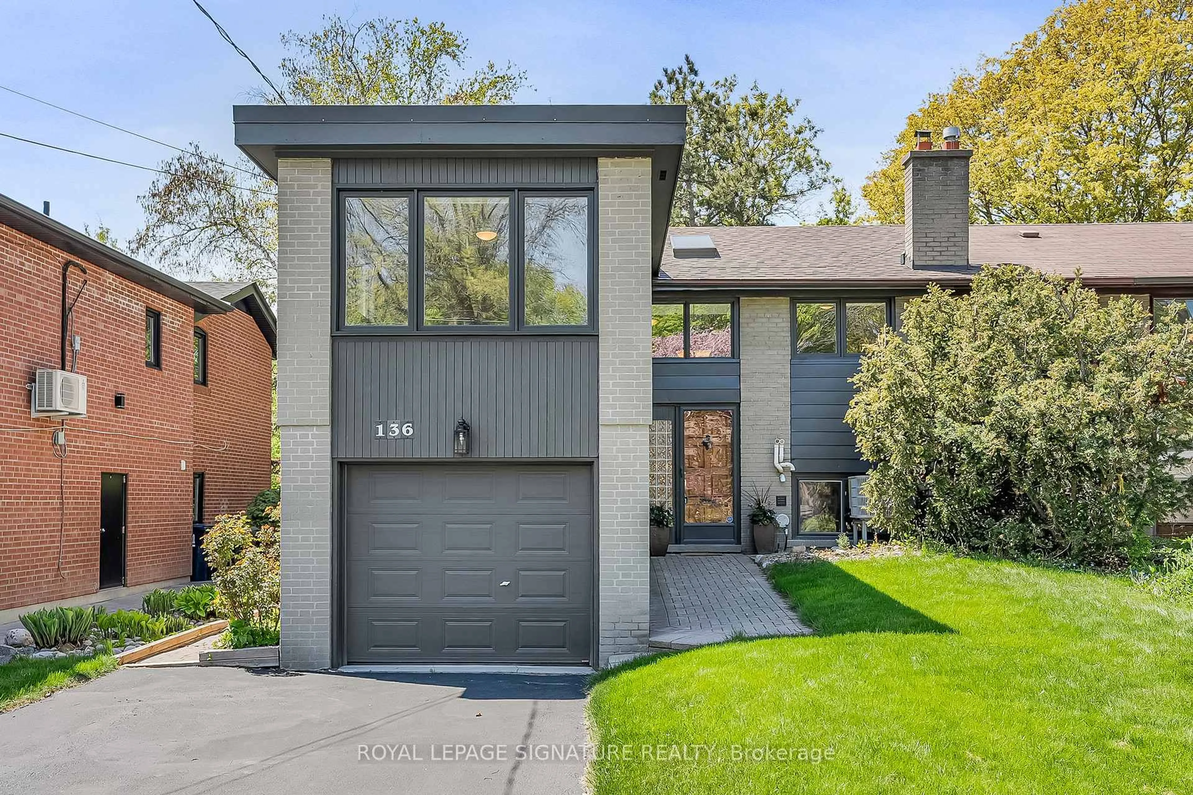 Home with brick exterior material, street for 136 Three Valleys Dr, Toronto Ontario M3A 3B9