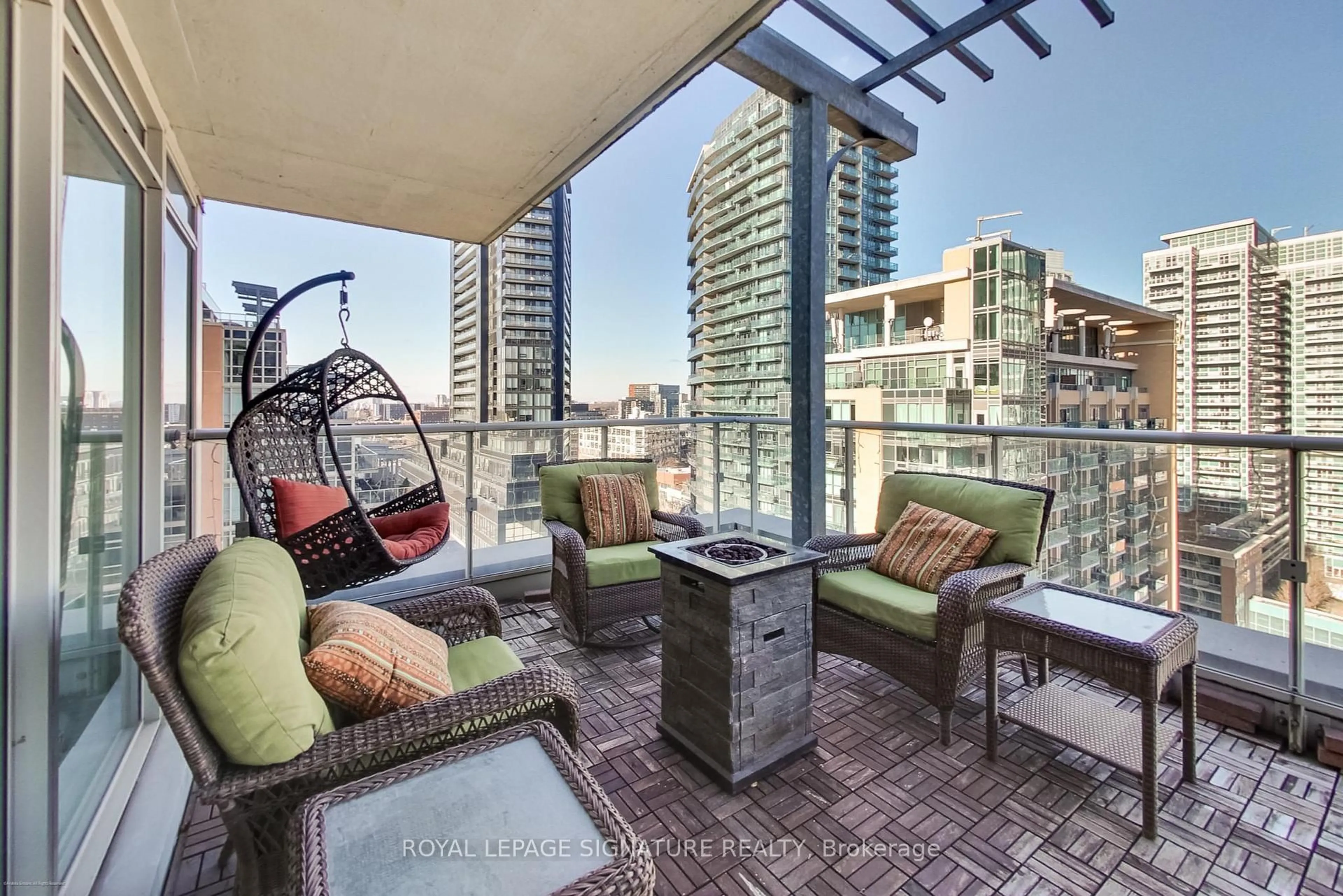 Patio, city buildings view from balcony for 75 East Liberty St #1616, Toronto Ontario M6K 3R3