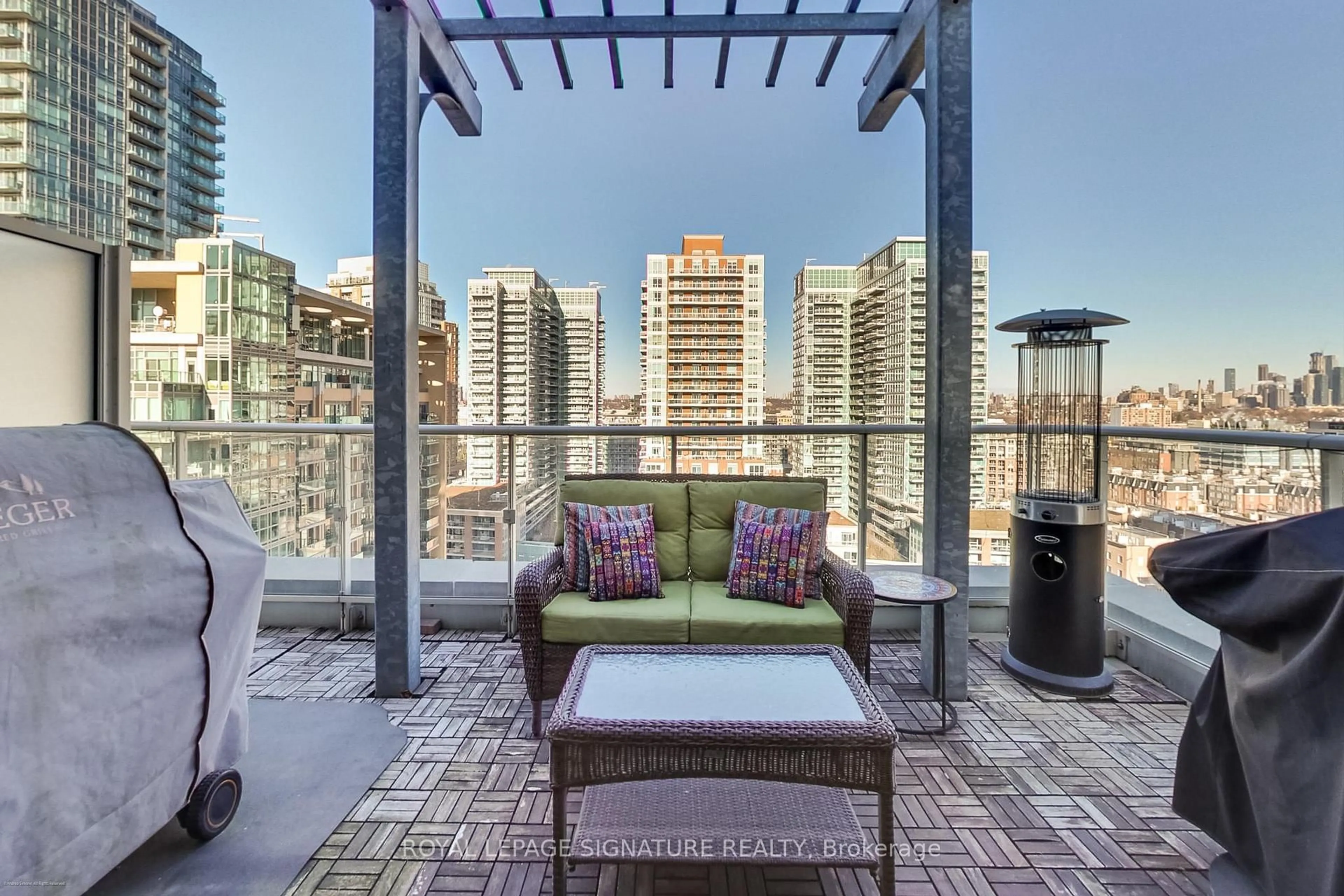 Patio, city buildings view from balcony for 75 East Liberty St #1616, Toronto Ontario M6K 3R3