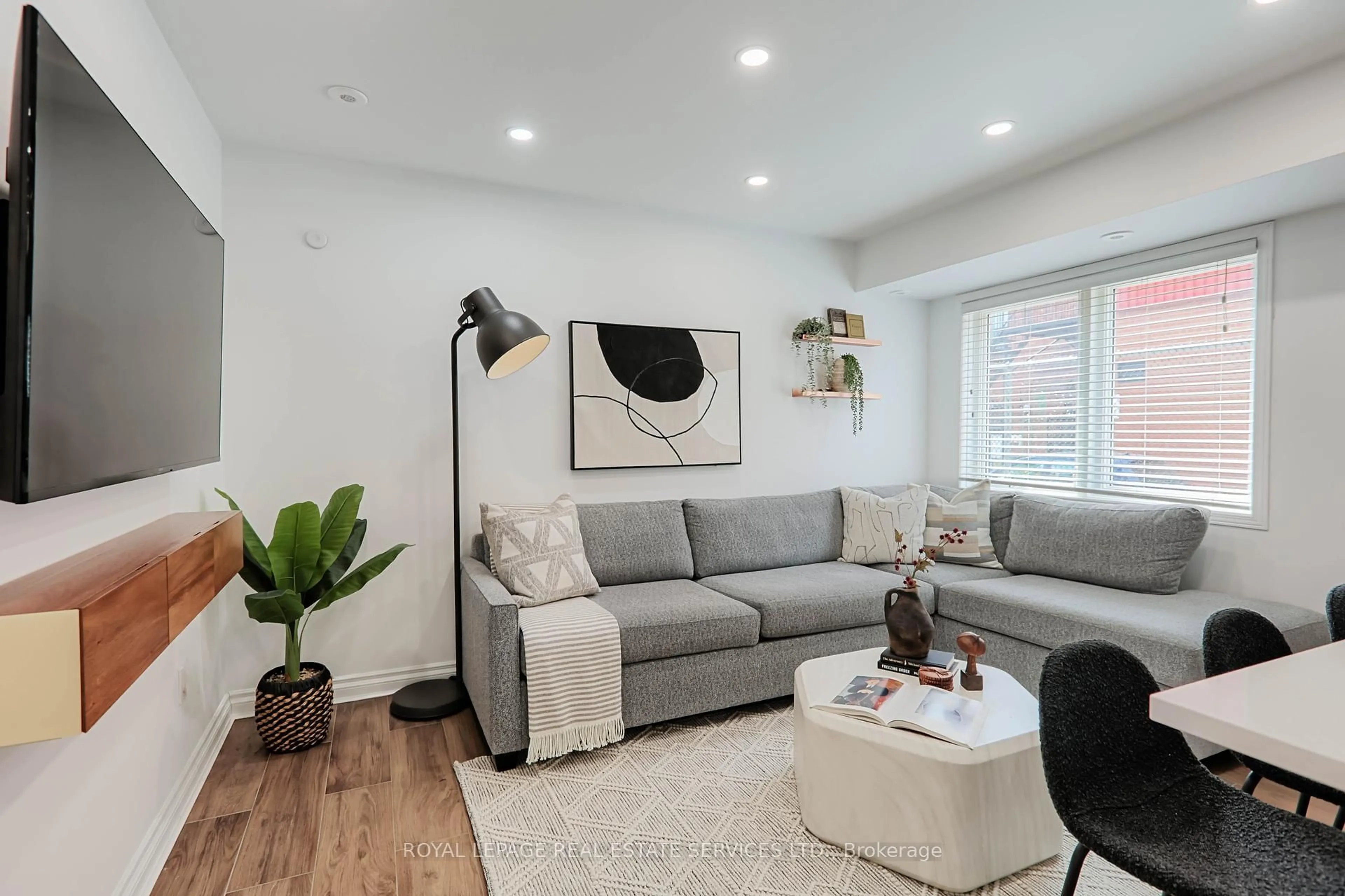 Living room with furniture, unknown for 40 Merchant Lane #113, Toronto Ontario M6P 4J6