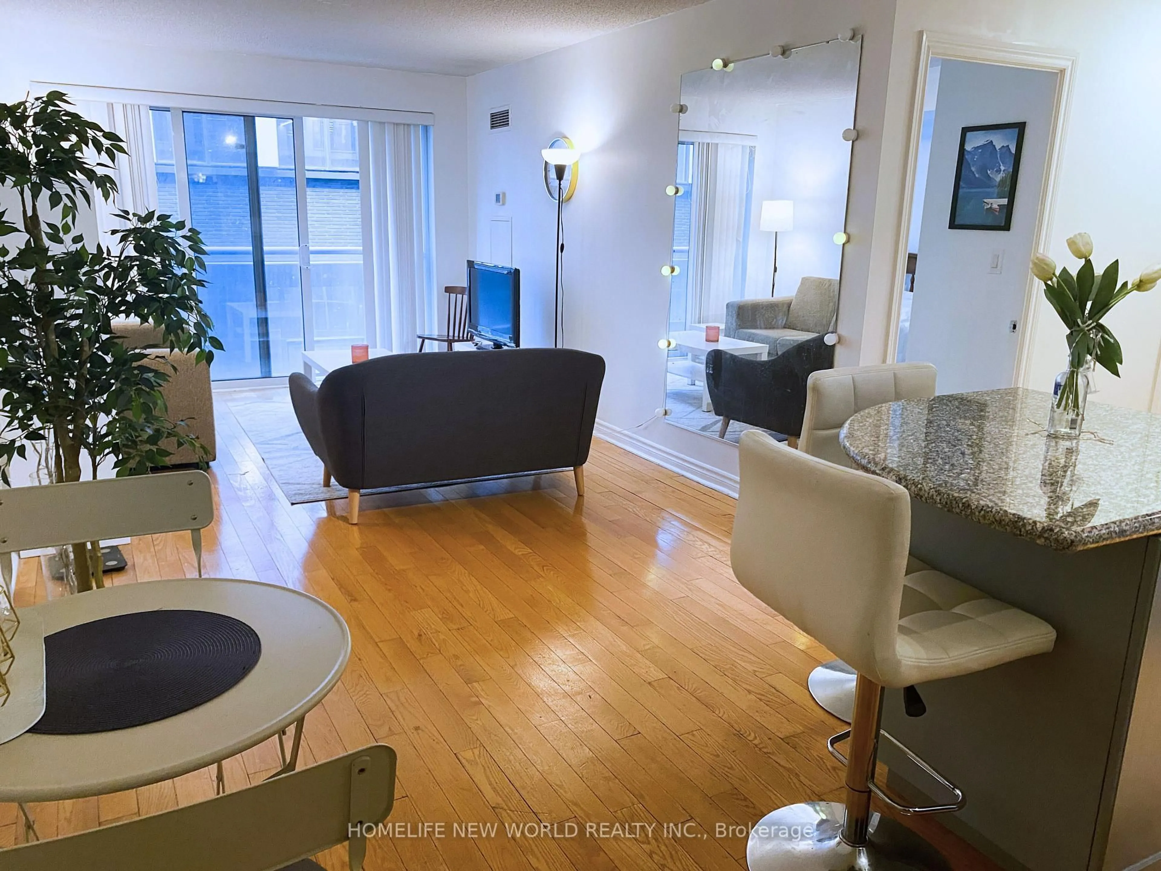 Living room with furniture, wood/laminate floor for 270 Wellington St #725, Toronto Ontario M5V 3P5