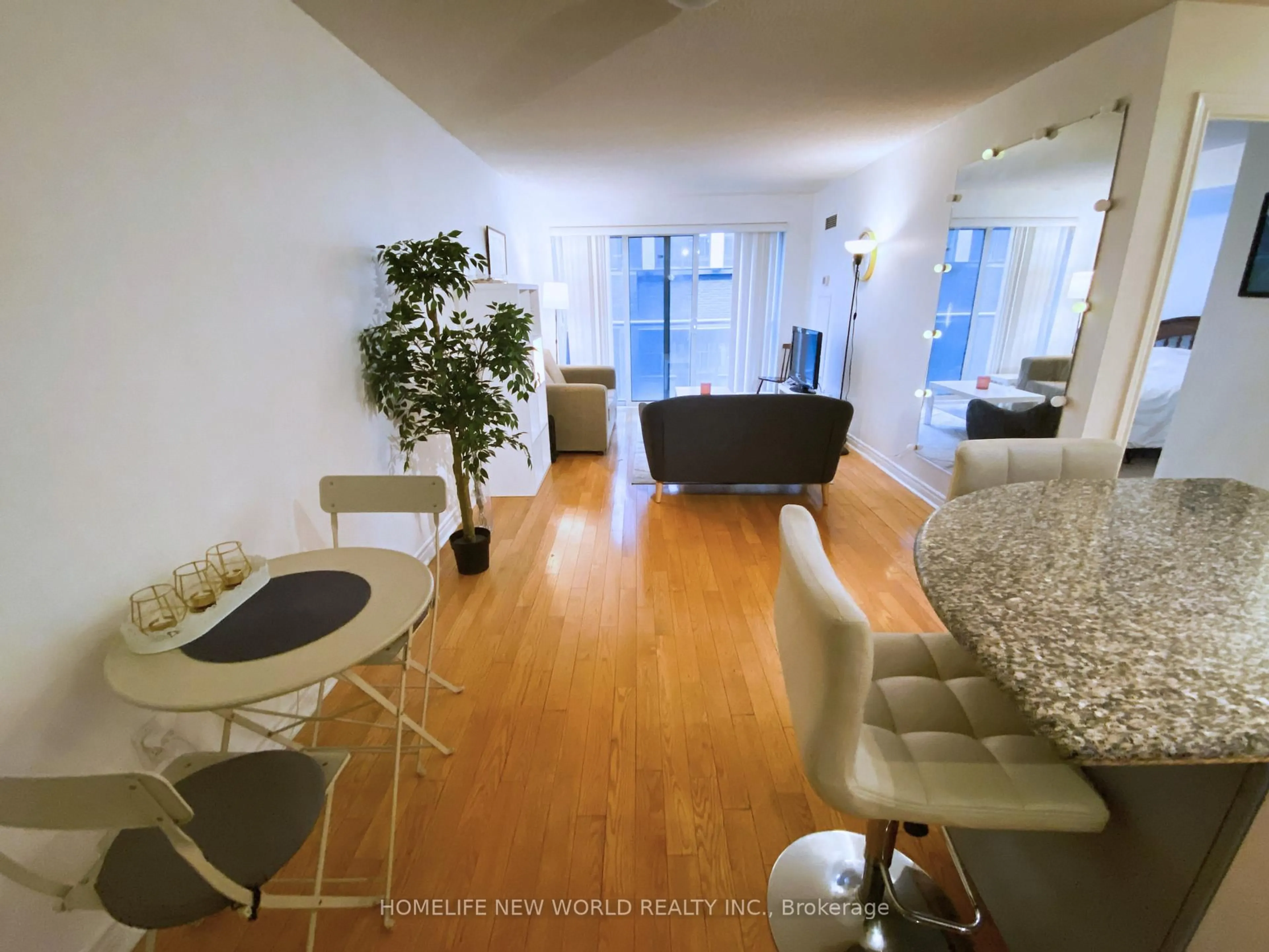 Living room with furniture, wood/laminate floor for 270 Wellington St #725, Toronto Ontario M5V 3P5