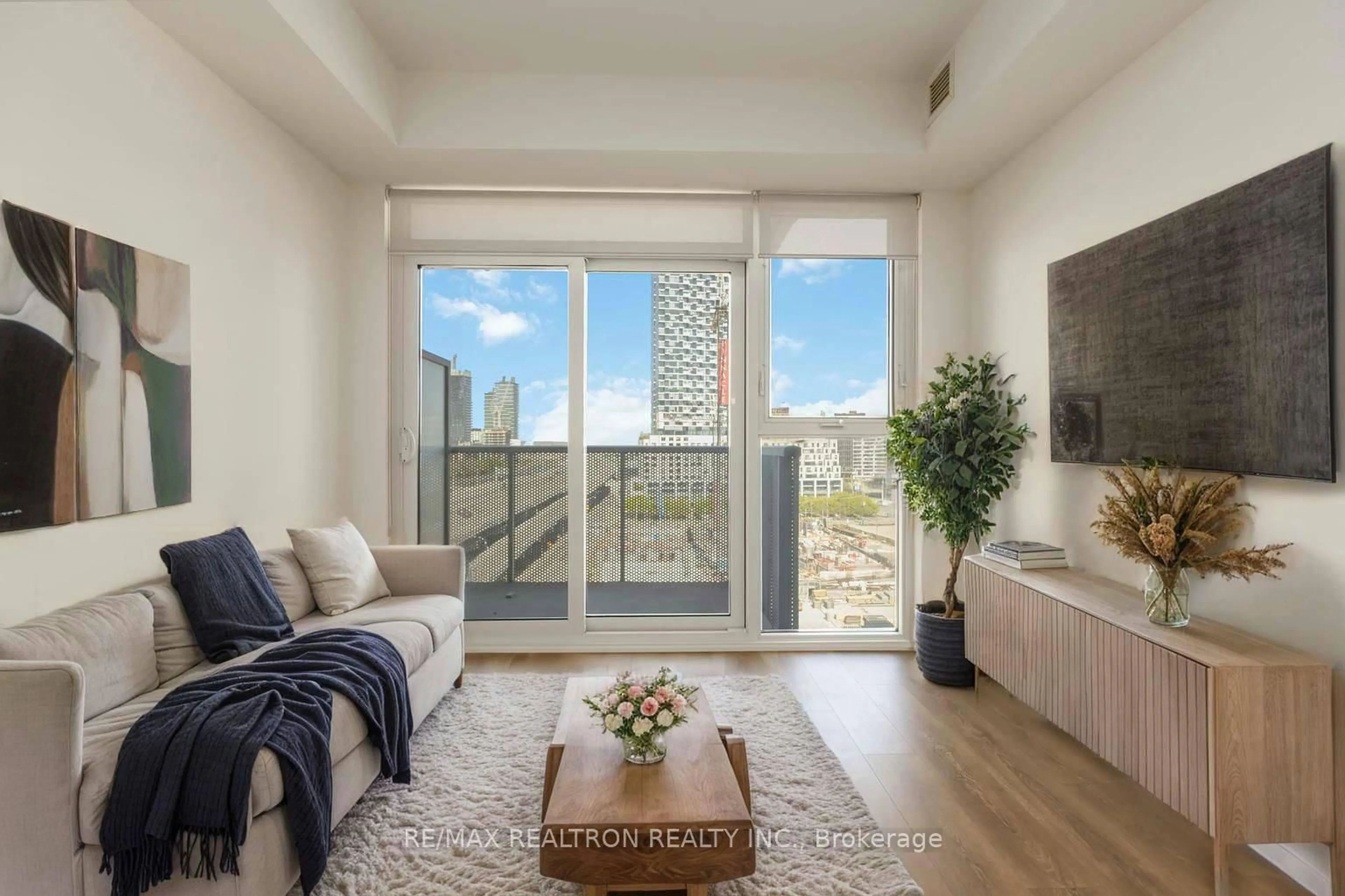 Living room with furniture, unknown for 20 Richardson St #720, Toronto Ontario M5B 0A5