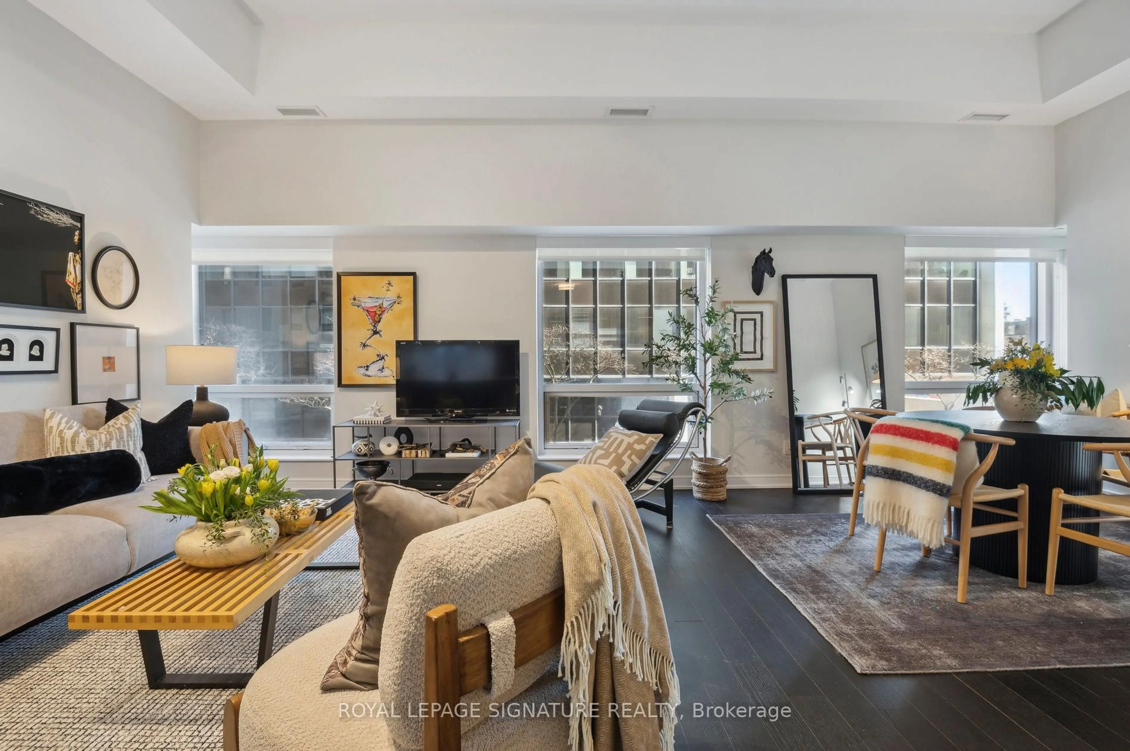 Living room with furniture, unknown for 88 Scott St #210, Toronto Ontario M5E 0A9