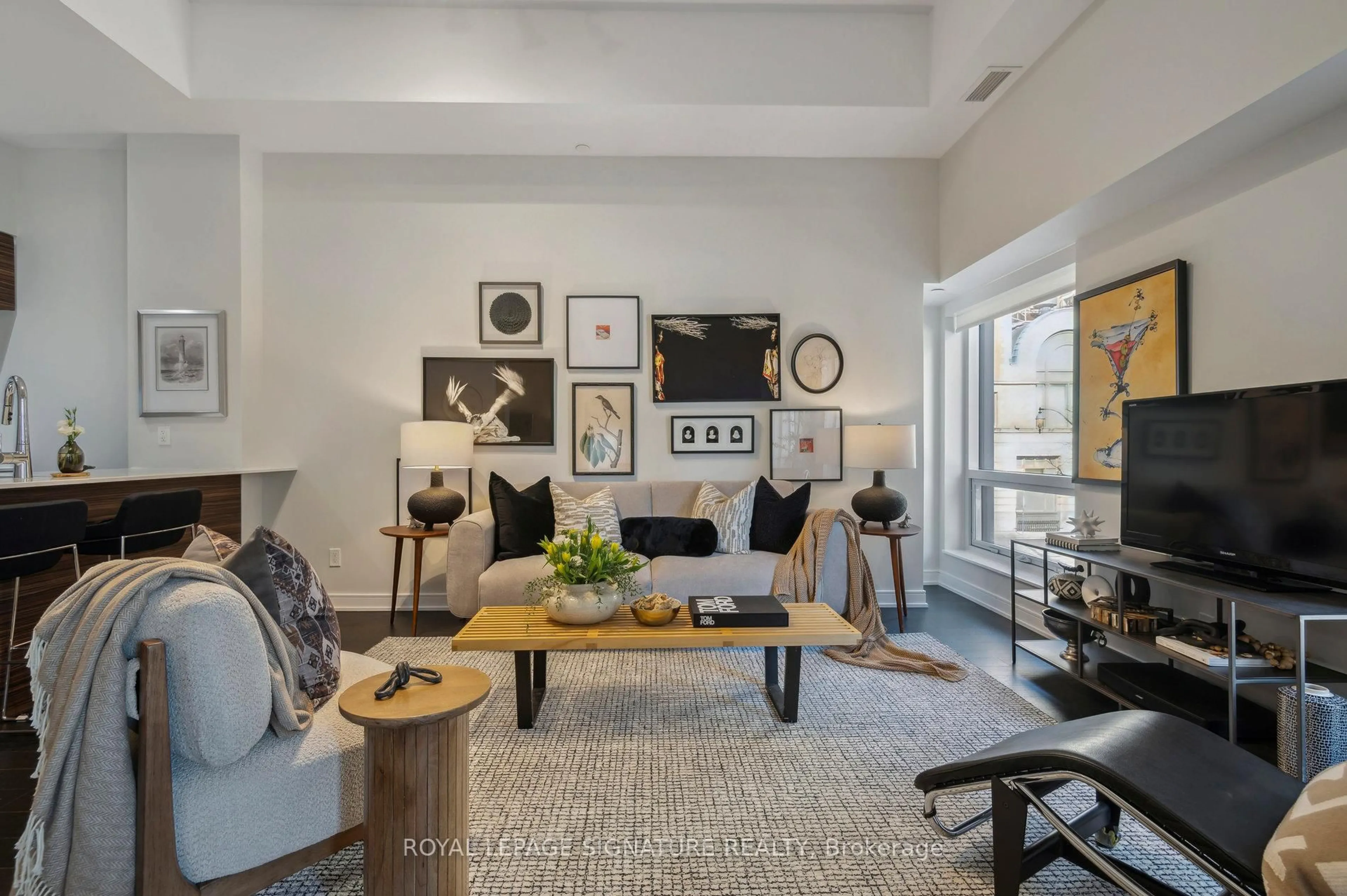 Living room with furniture, unknown for 88 Scott St #210, Toronto Ontario M5E 0A9