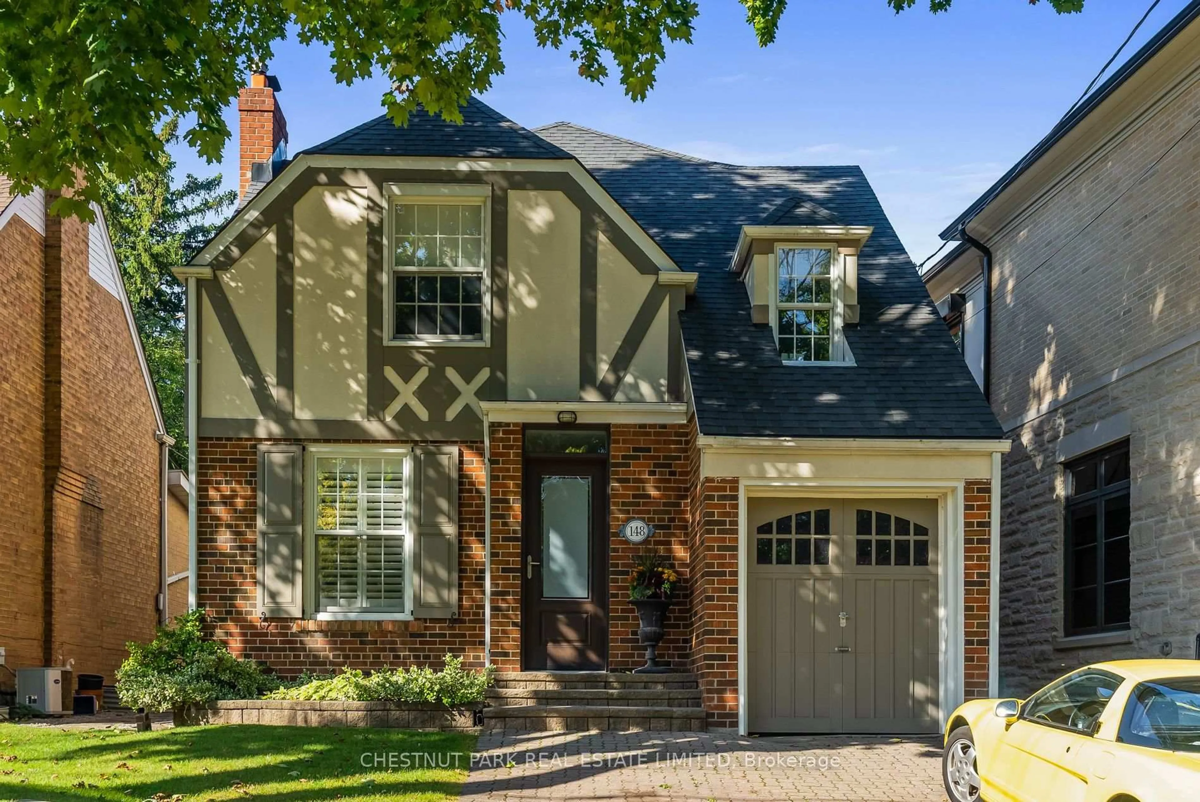 Home with brick exterior material, street for 148 Hanna Rd, Toronto Ontario M4G 3N7