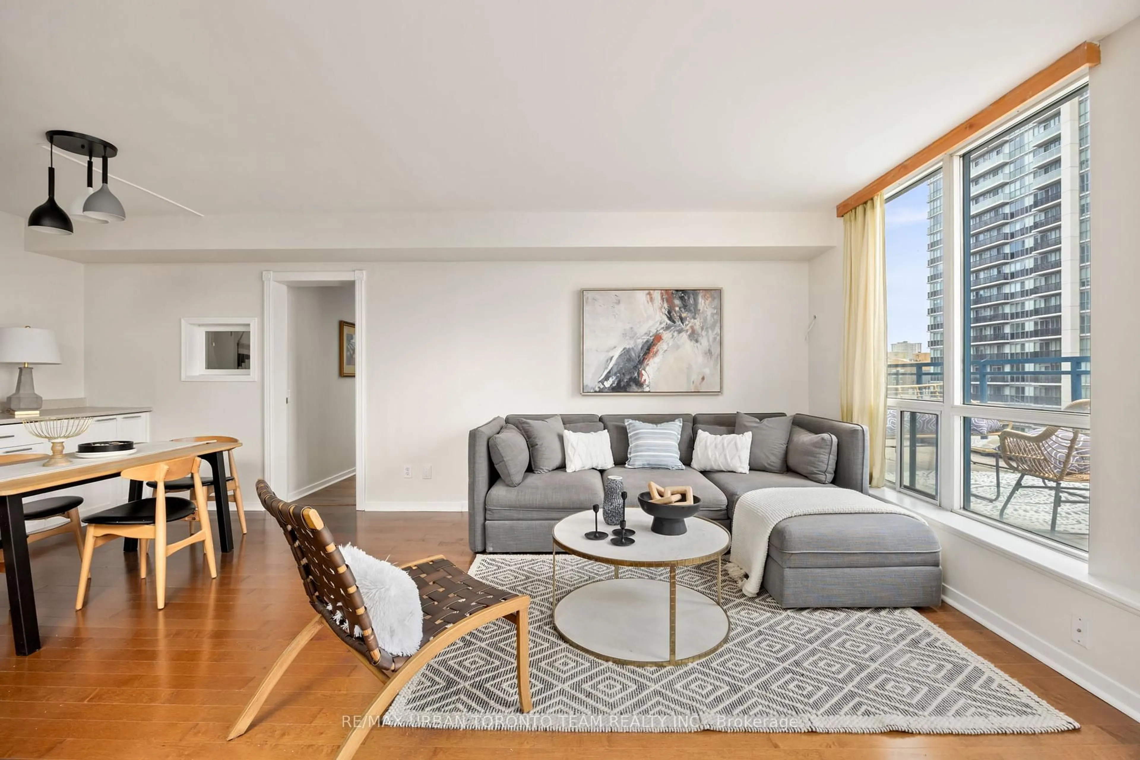 Living room with furniture, wood/laminate floor for 75 Dalhousie St #1108&1109, Toronto Ontario M5B 2R9