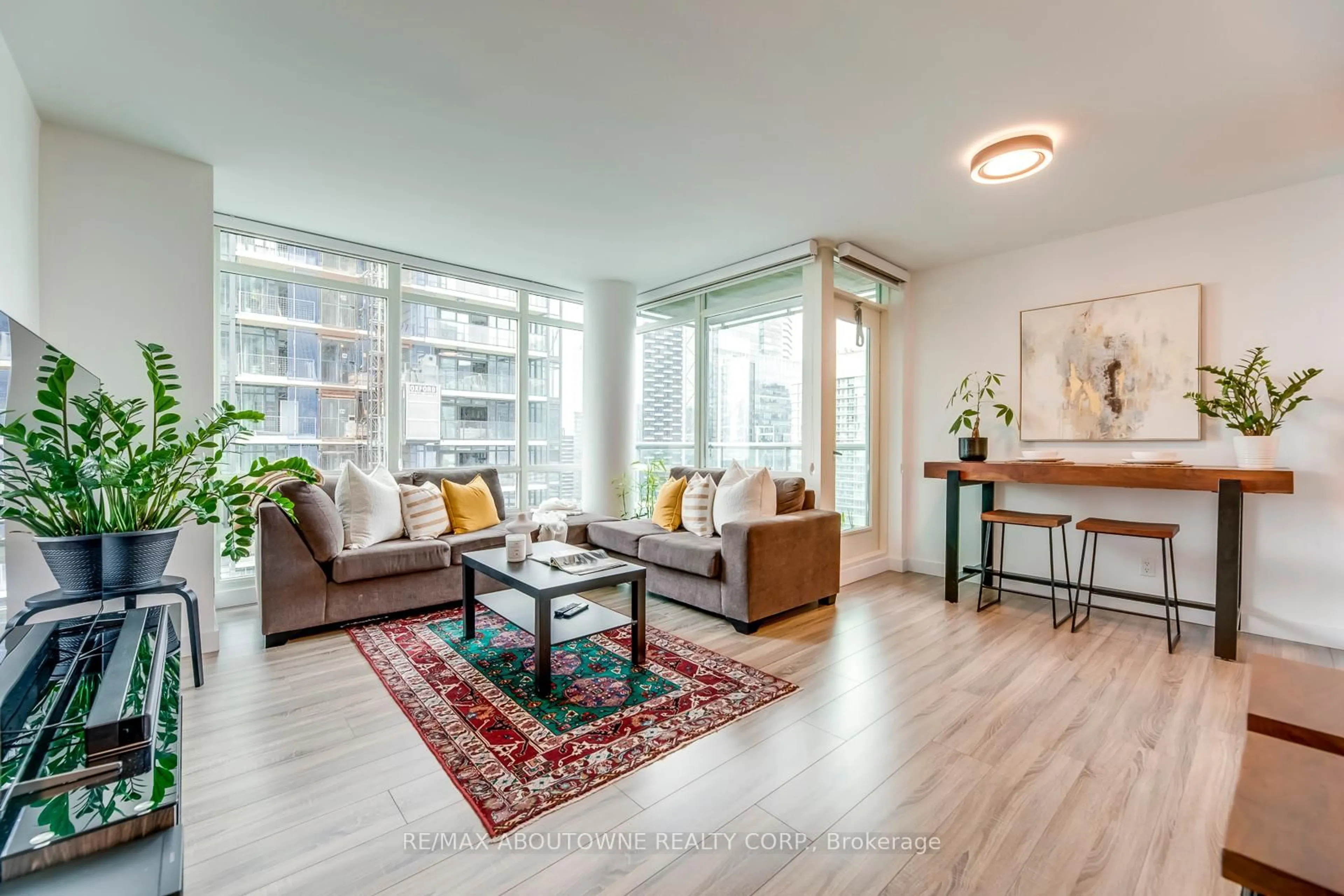 Living room with furniture, wood/laminate floor for 81 Navy Wharf Crt #3308, Toronto Ontario M5V 3S2