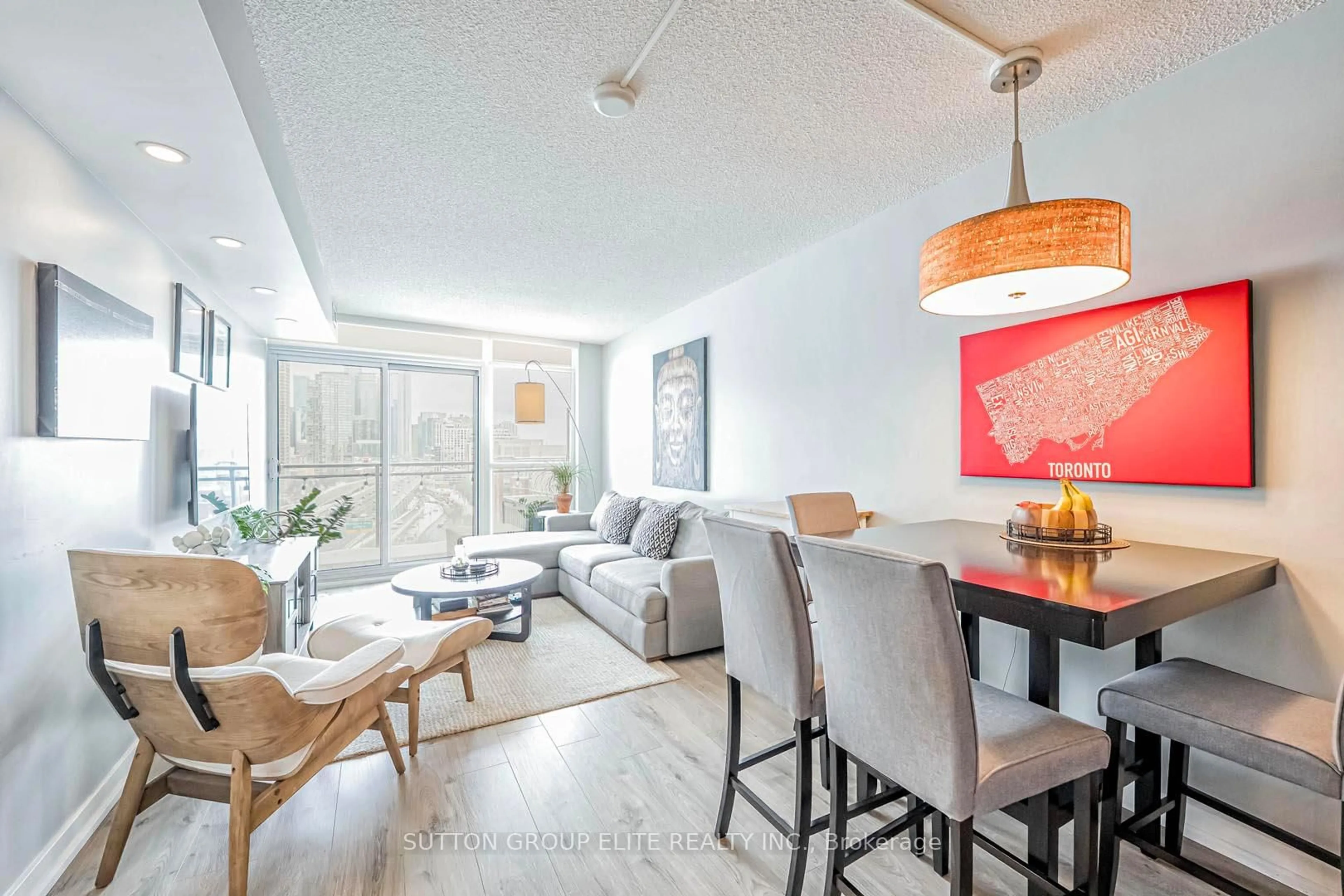 Living room with furniture, wood/laminate floor for 38 Dan Leckie Way #1611, Toronto Ontario M5V 2V6