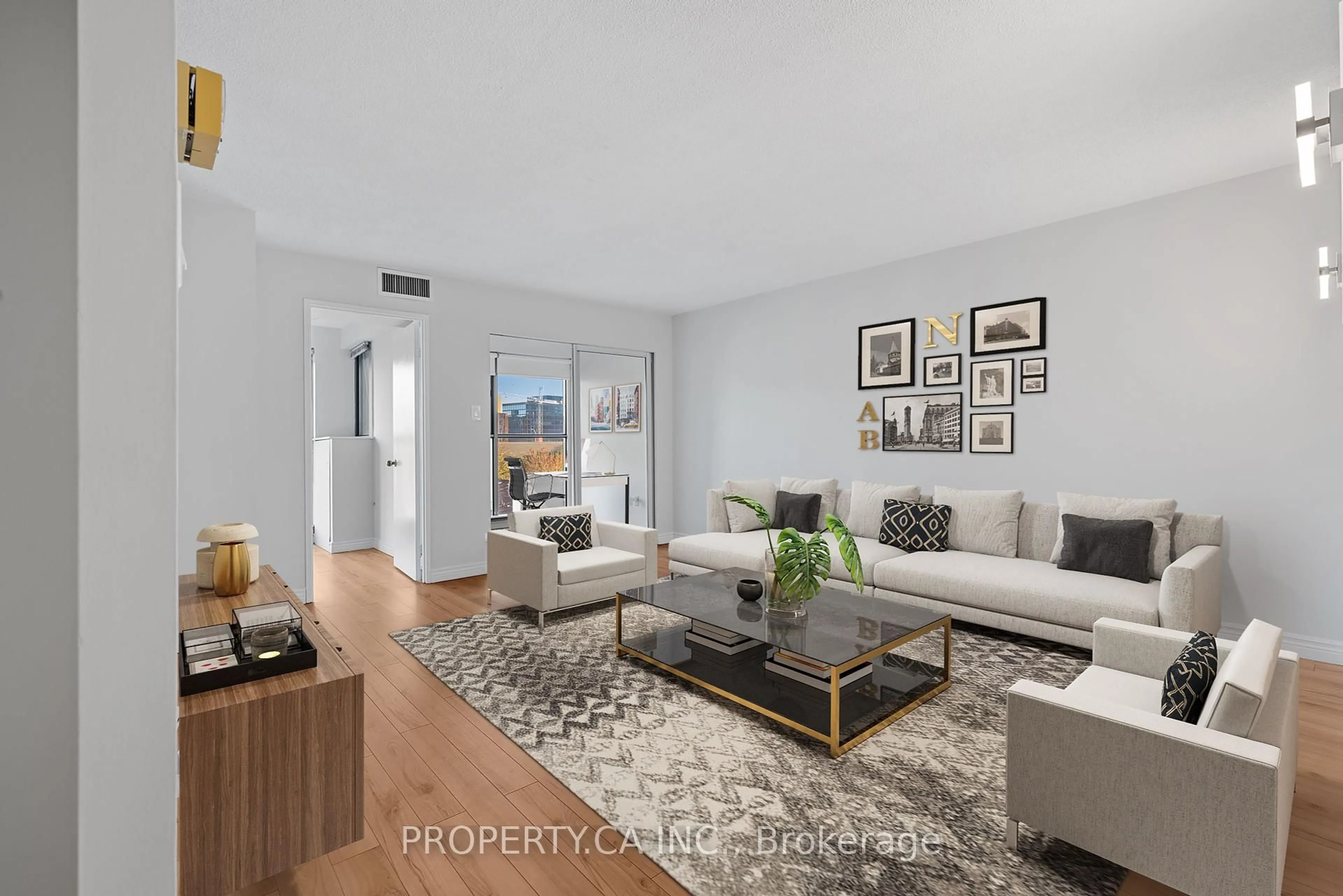 Living room with furniture, unknown for 65 Scadding Ave #608, Toronto Ontario M5A 4L1