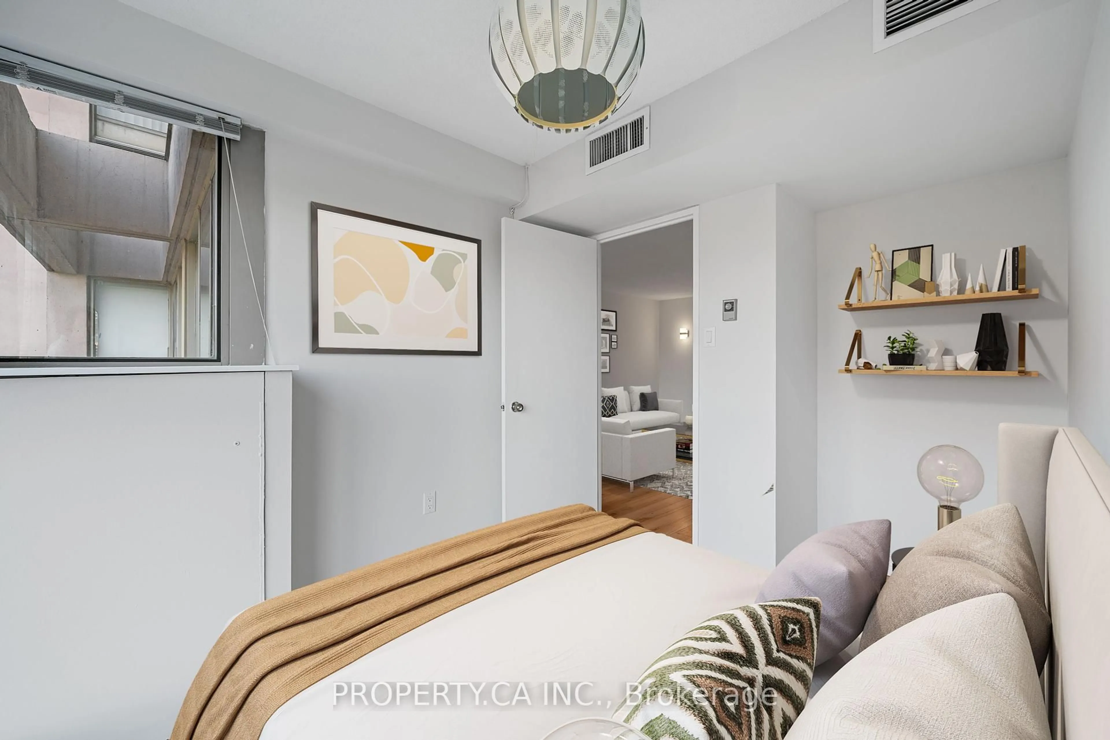 Bedroom with bed, unknown for 65 Scadding Ave #608, Toronto Ontario M5A 4L1