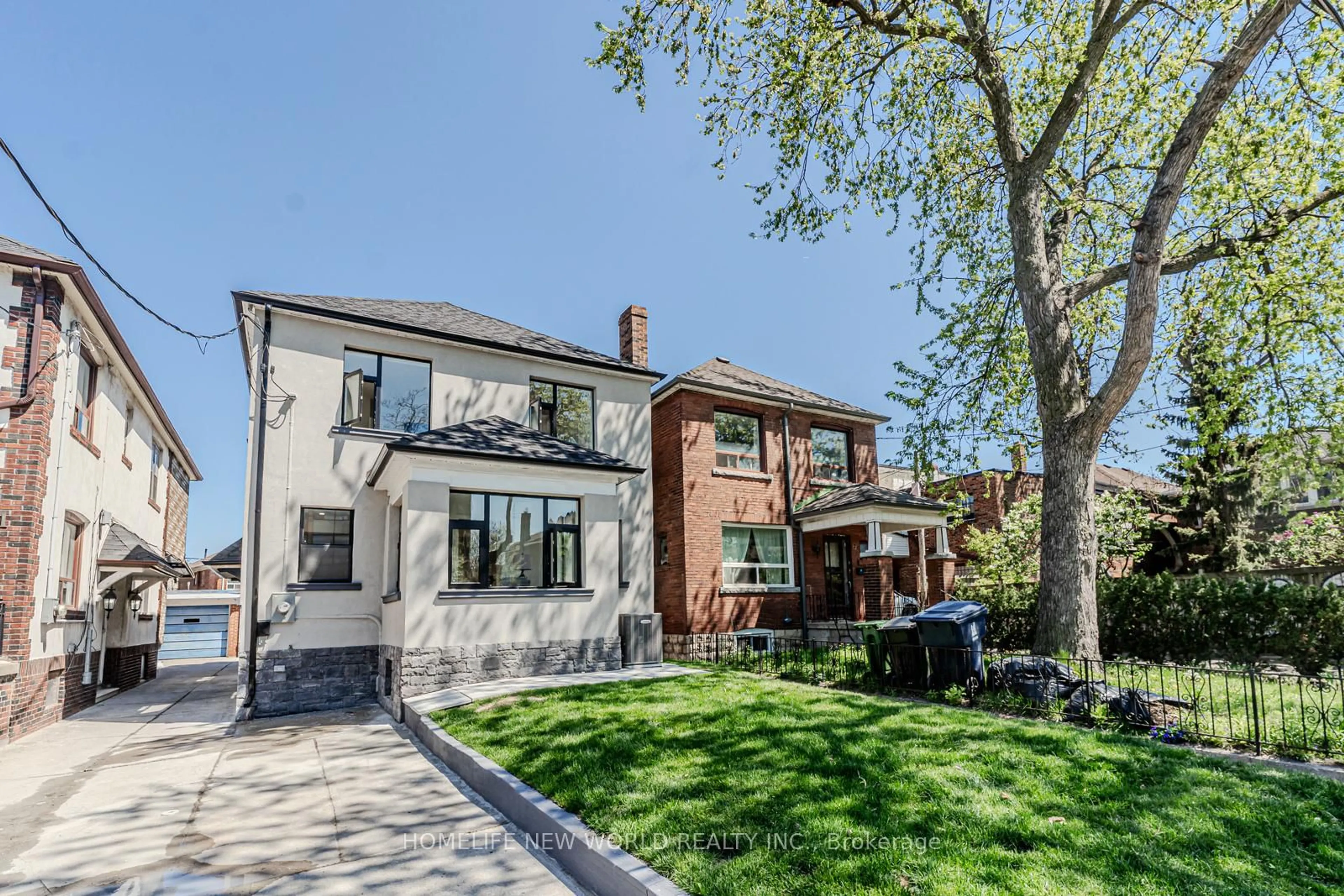 Home with brick exterior material, street for 9 Rusholme Dr, Toronto Ontario M6J 3K1